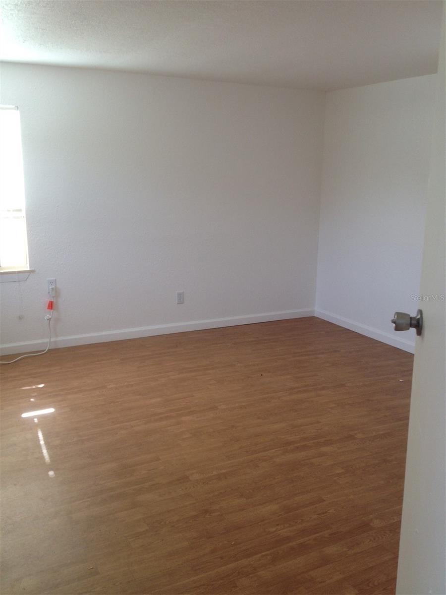 upstairs apartment living space another view - 100 ALACHUA DR, WINTER HAVEN