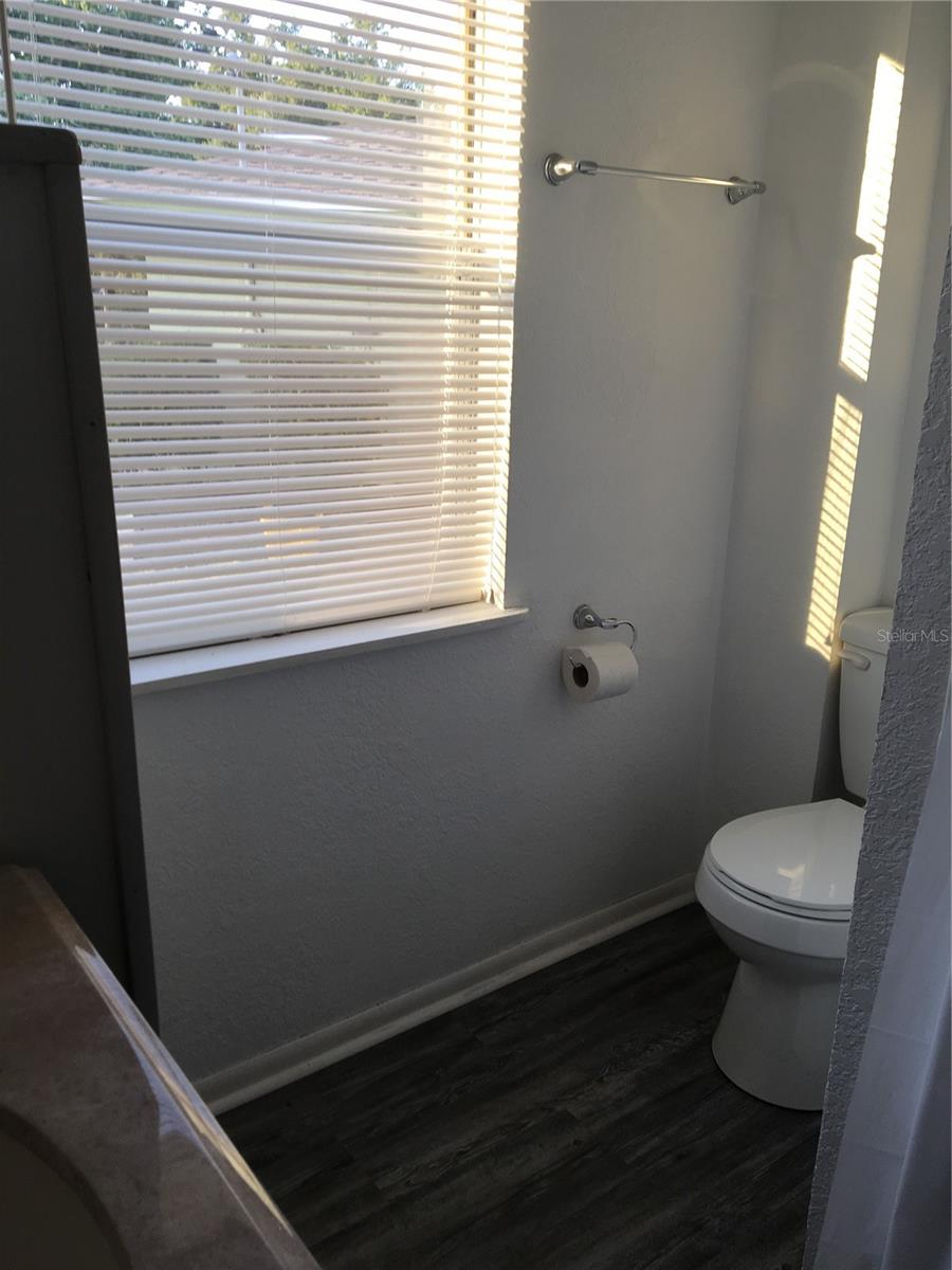 bathroom in downstairs apartment - 100 ALACHUA DR, WINTER HAVEN
