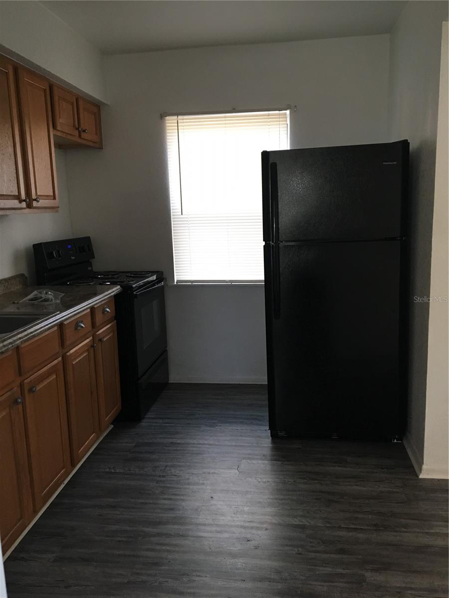 downstairs apartment kitchen - 100 ALACHUA DR, WINTER HAVEN