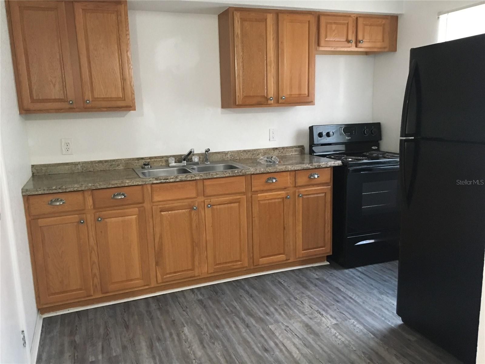 downstairs apartment kitchen - 100 ALACHUA DR, WINTER HAVEN