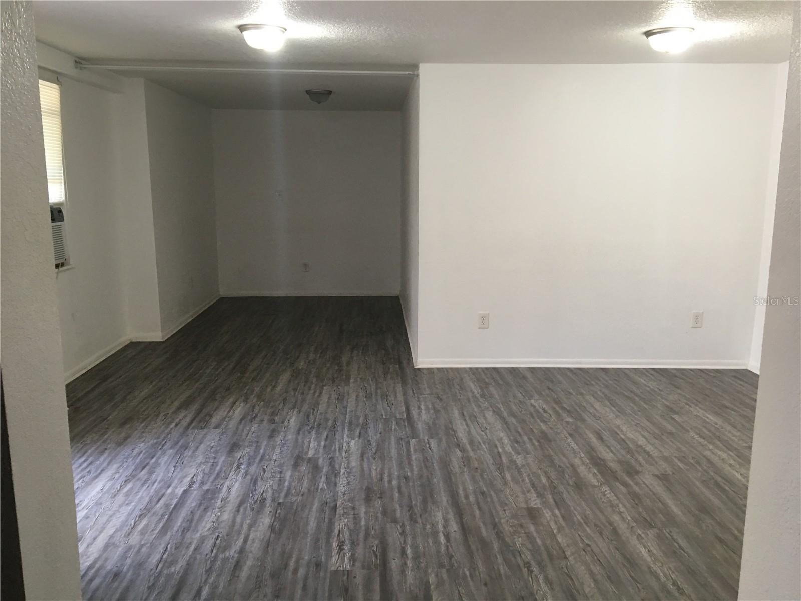 another view of downstairs apartment living space - 100 ALACHUA DR, WINTER HAVEN