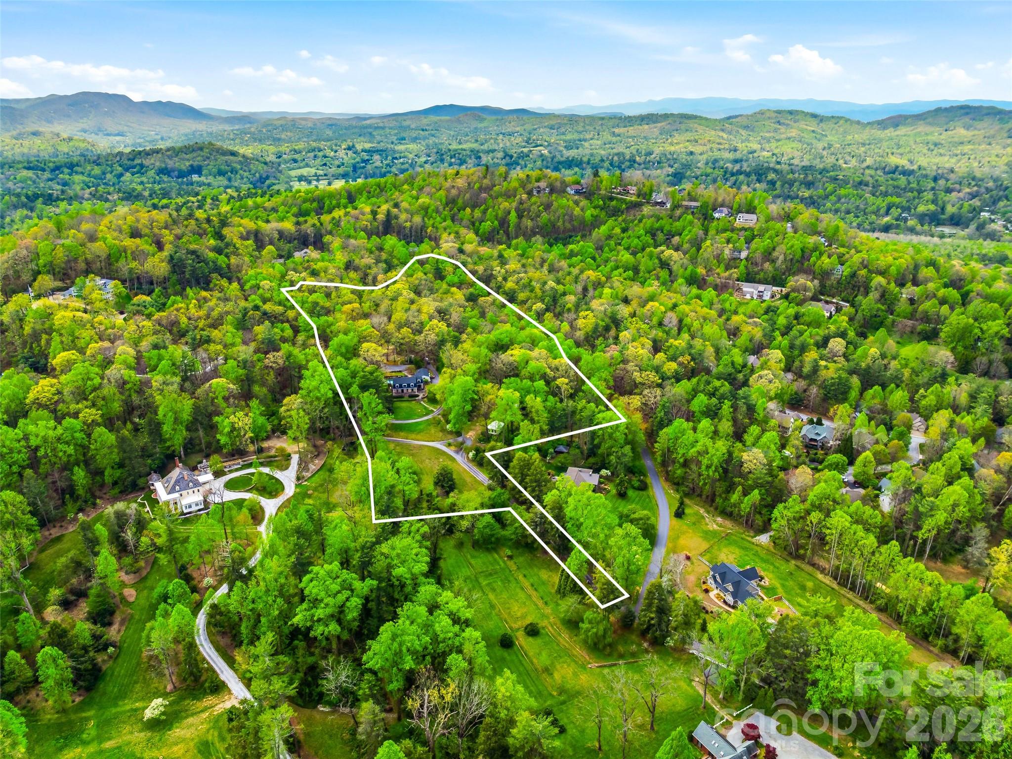 Rarely does a home offer such a convenient location paired with this level of privacy on 5.74 acres. - 10 Kalimar Heights, Hendersonville