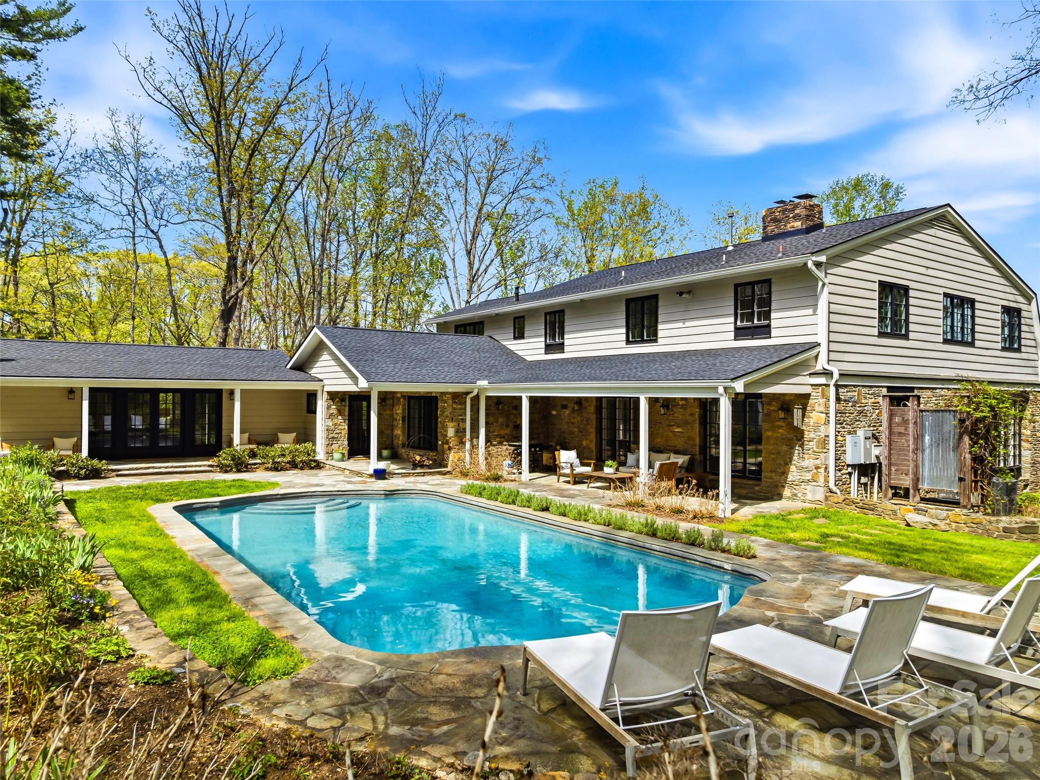 Beautifully restored gunite pool with stone surround and professionally landscaped. You'll be surrounded with blooms from spring to fall. - 10 Kalimar Heights, Hendersonville