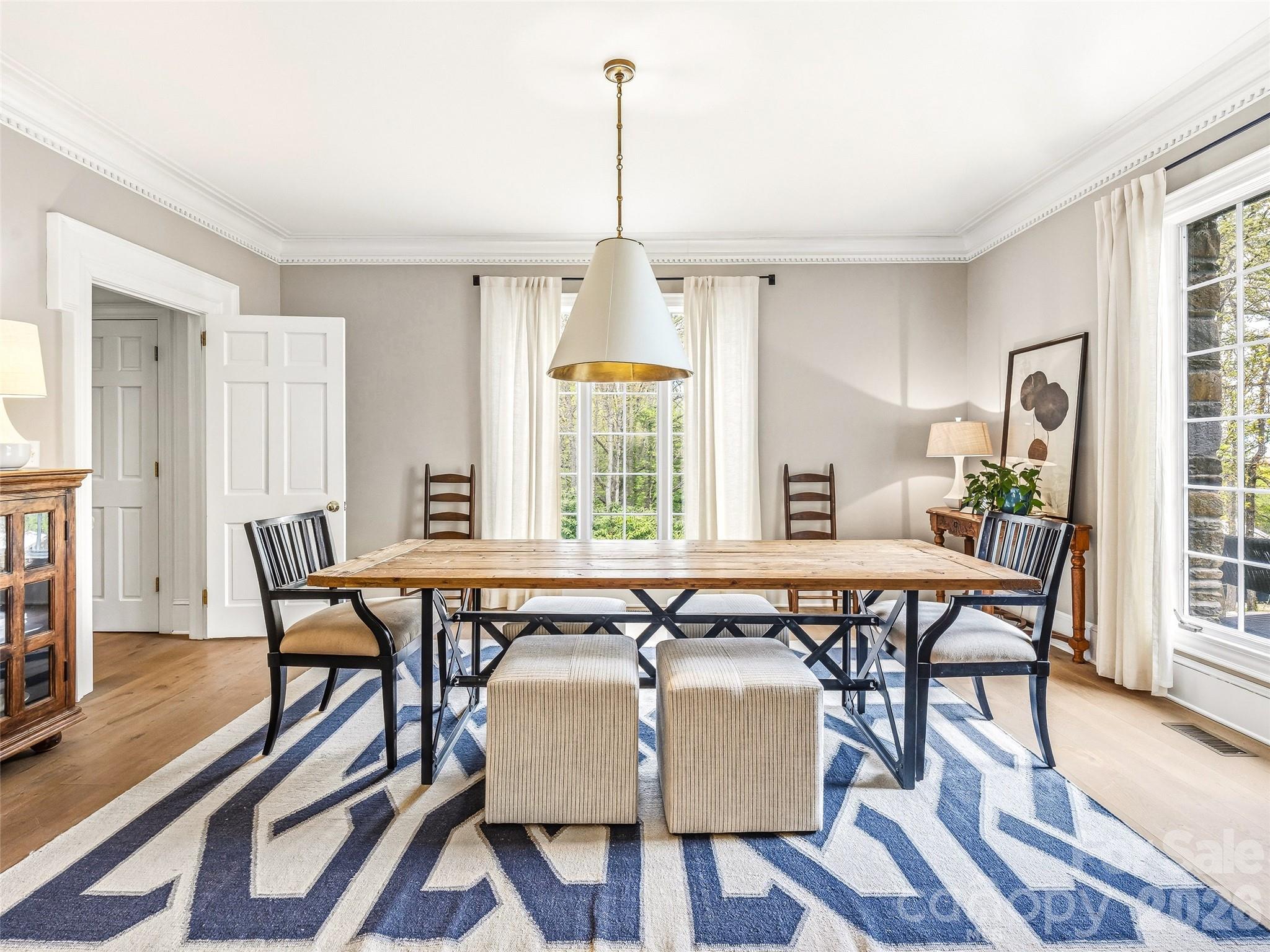 Light filled dining room with plenty of space for guests and entertaining. - 10 Kalimar Heights, Hendersonville