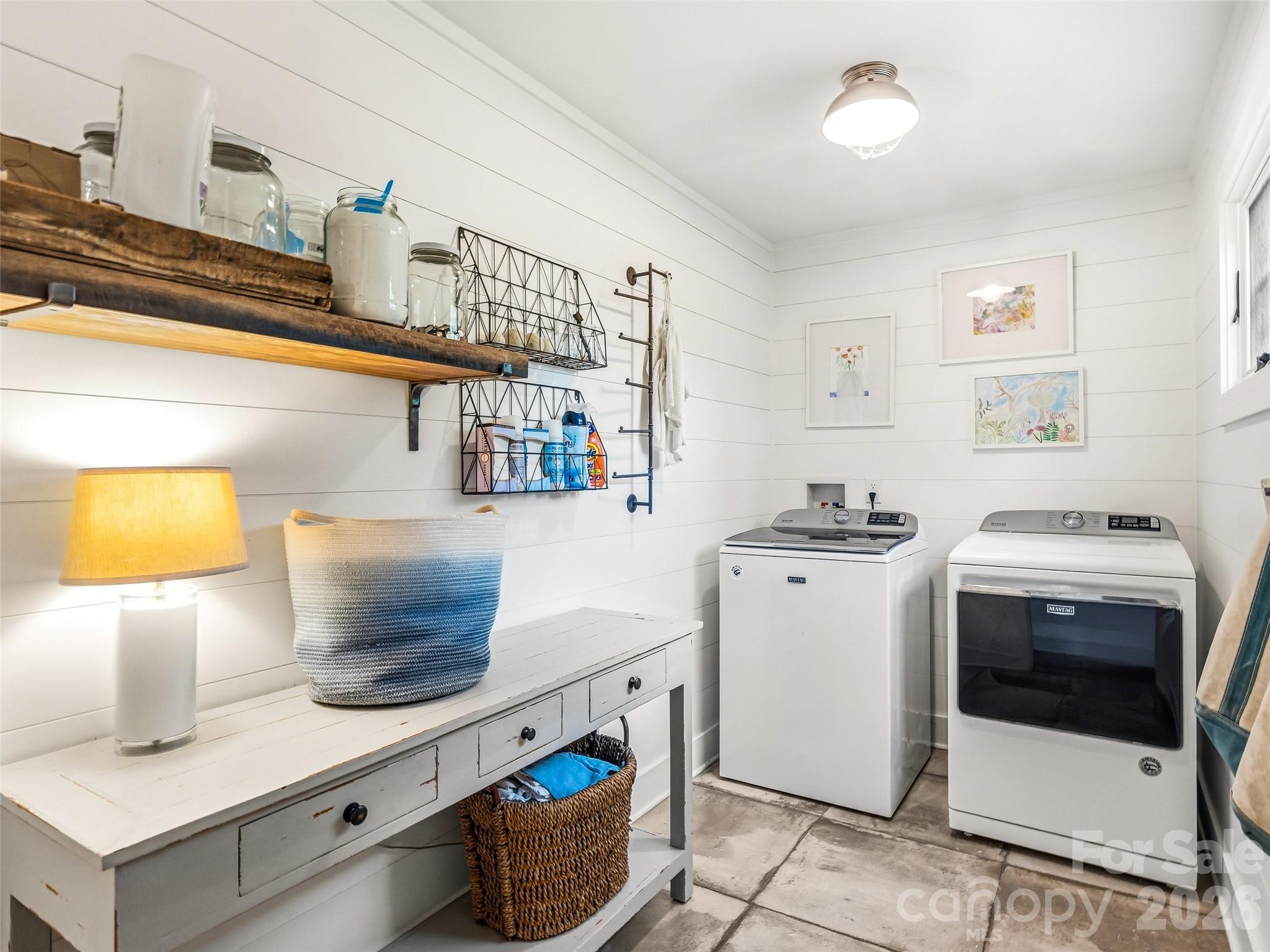Conveniently located laundry room on the main level off of the mudroom. - 10 Kalimar Heights, Hendersonville