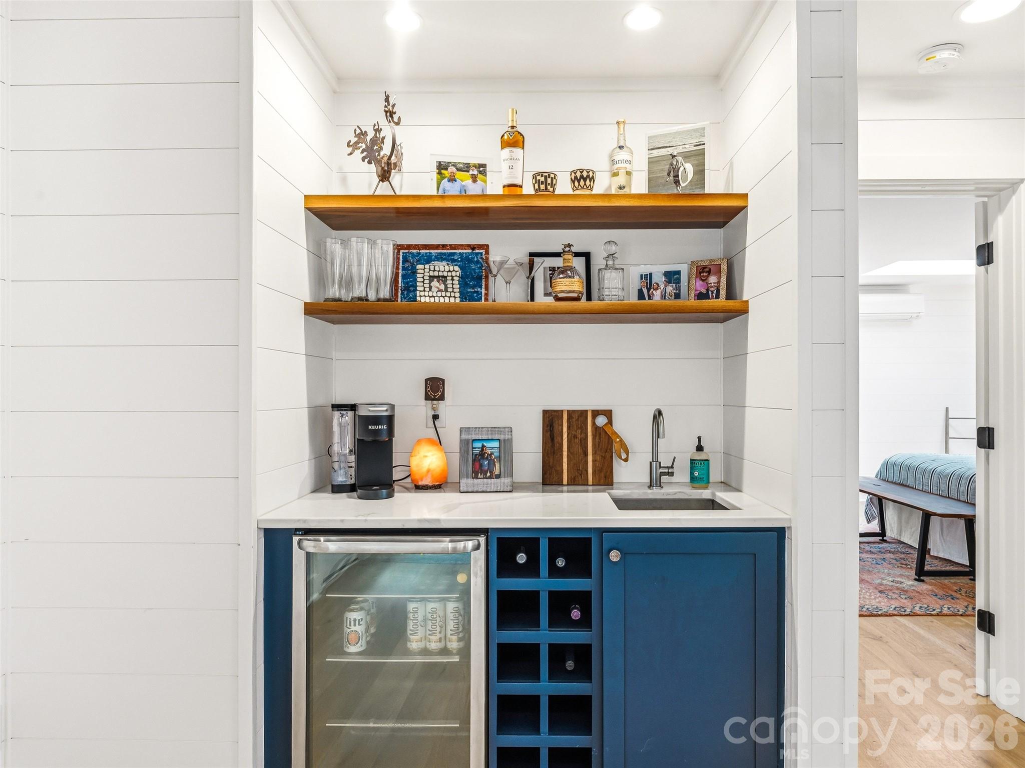 Wet bar in the guest wing with beverage refrigerator. - 10 Kalimar Heights, Hendersonville