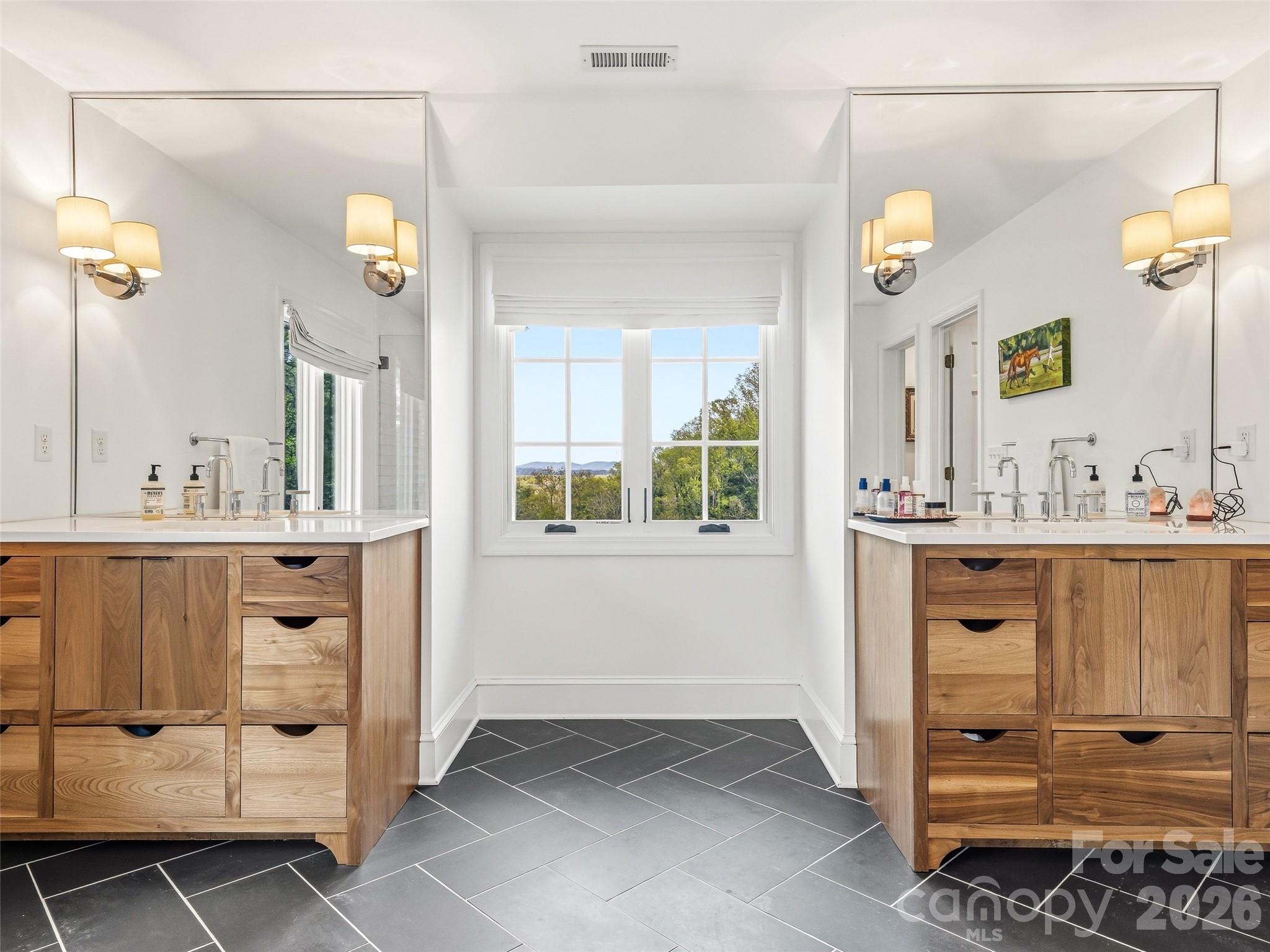 Custom built vanities in the spa like primary bathroom. - 10 Kalimar Heights, Hendersonville