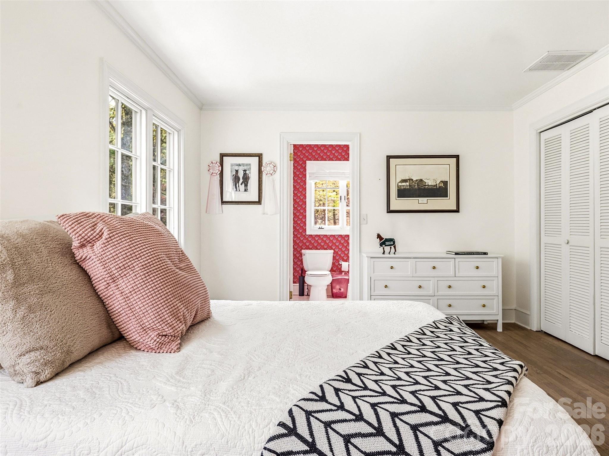Fourth bedroom featuring built-in's and stylishly updated en-suite full bathroom. - 10 Kalimar Heights, Hendersonville