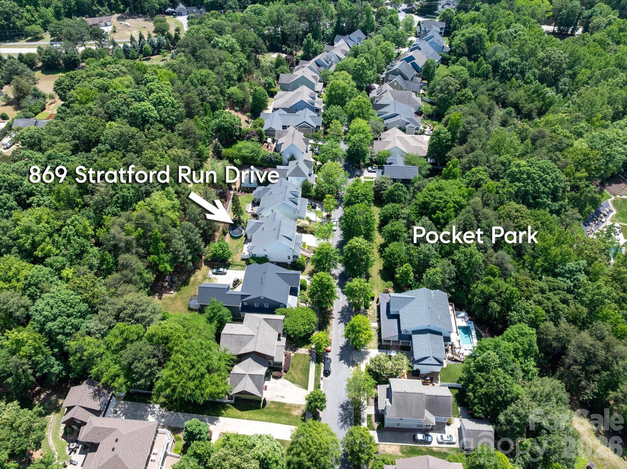 Backs to woods and faces a pocket park - 869 Stratford Run Drive, Fort Mill
