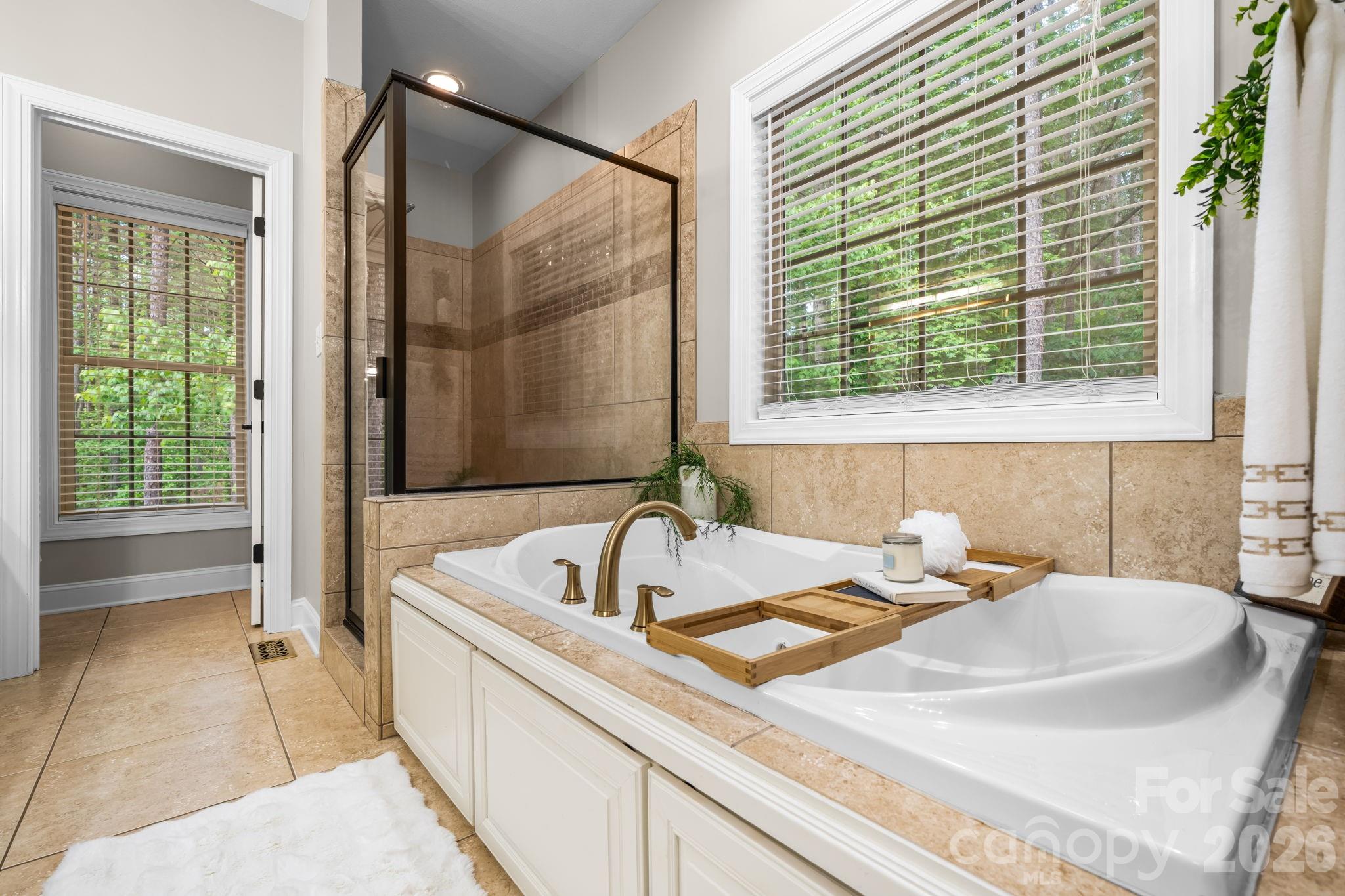Primary Walk-in with large tiled shower - 4950 River Hills Drive, Denver