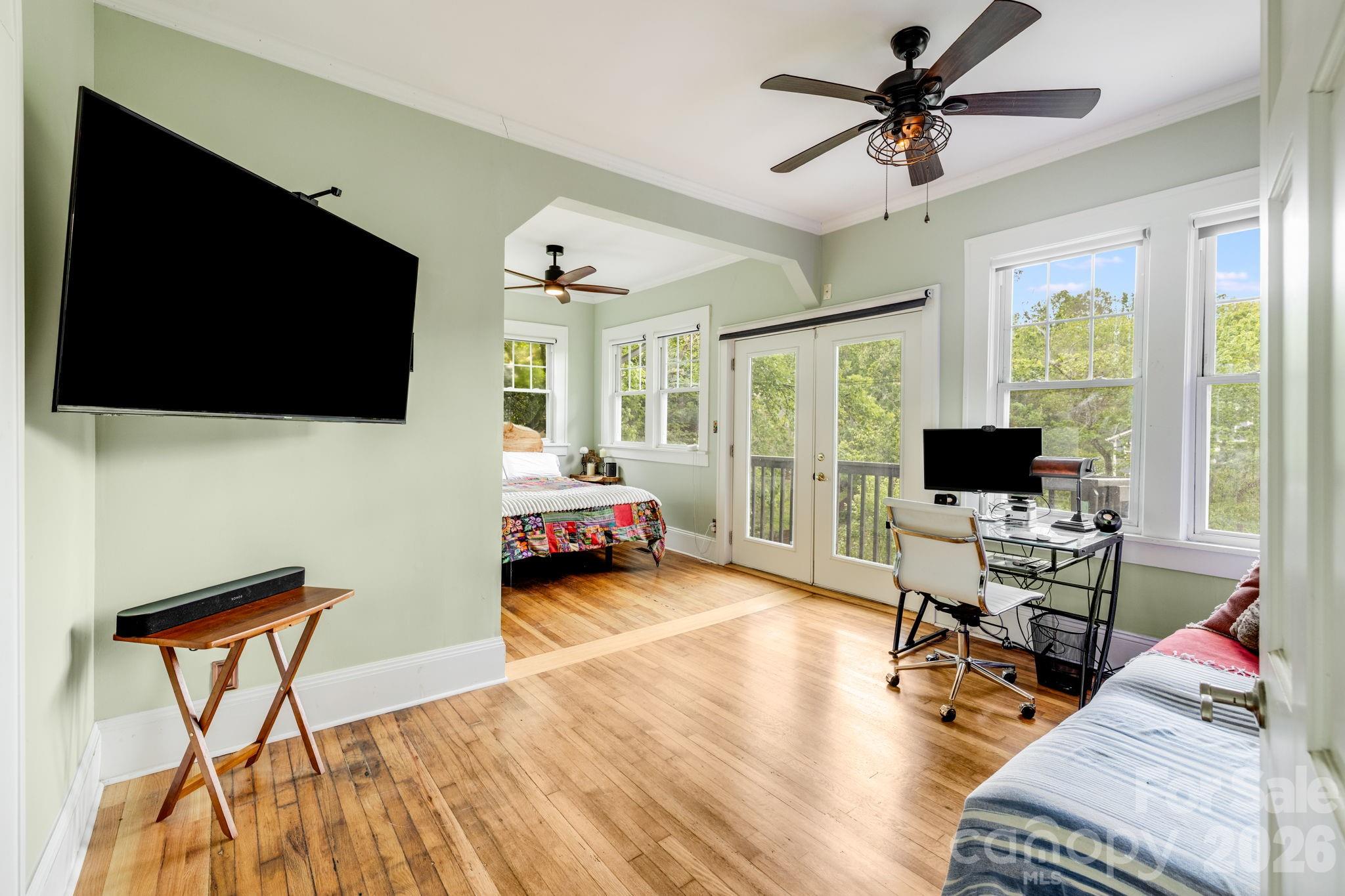 Main level primary bedroom sitting room - 107 Courtland Avenue, Asheville