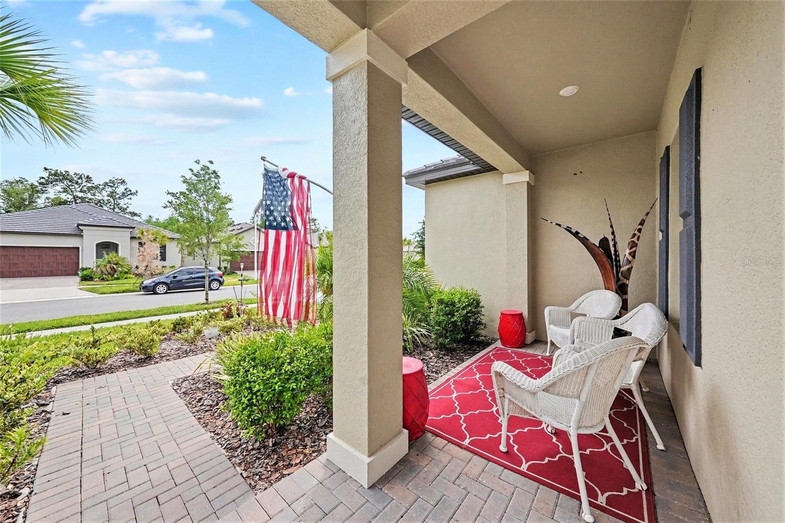 Front Porch - 10395 BANYAN BREEZE BLVD, LAND O LAKES
