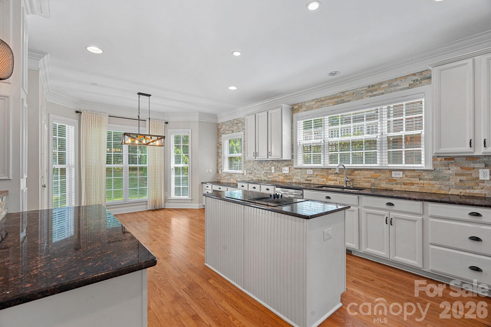 Single Family Residence at 11215 Warfield Avenue, Huntersville, photo 7 of 44