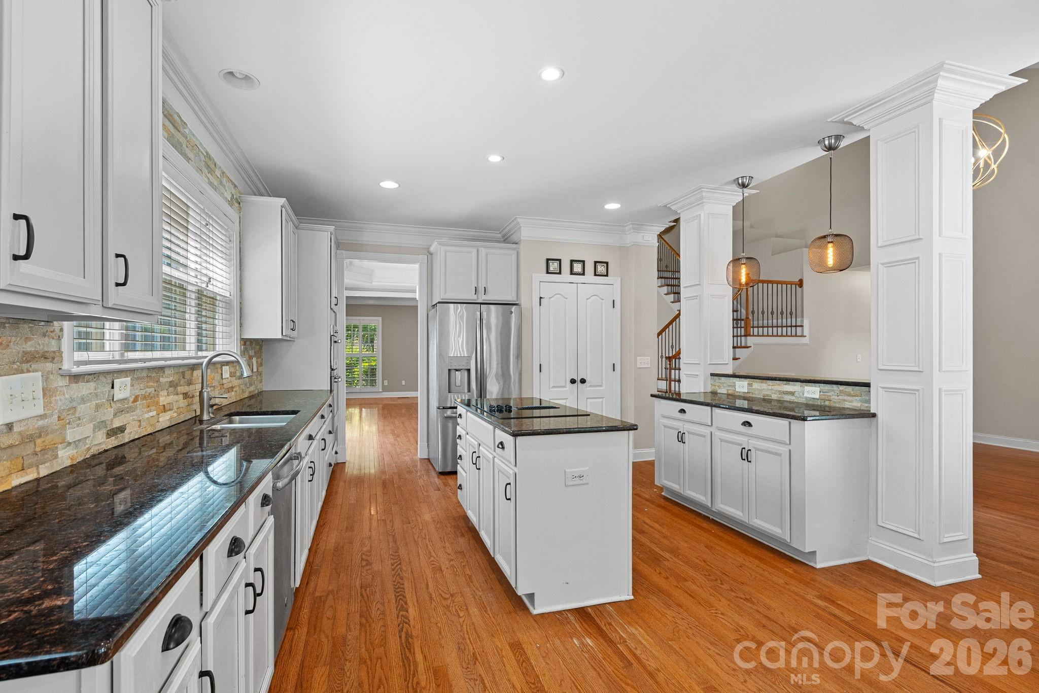 Single Family Residence at 11215 Warfield Avenue, Huntersville, photo 5 of 44