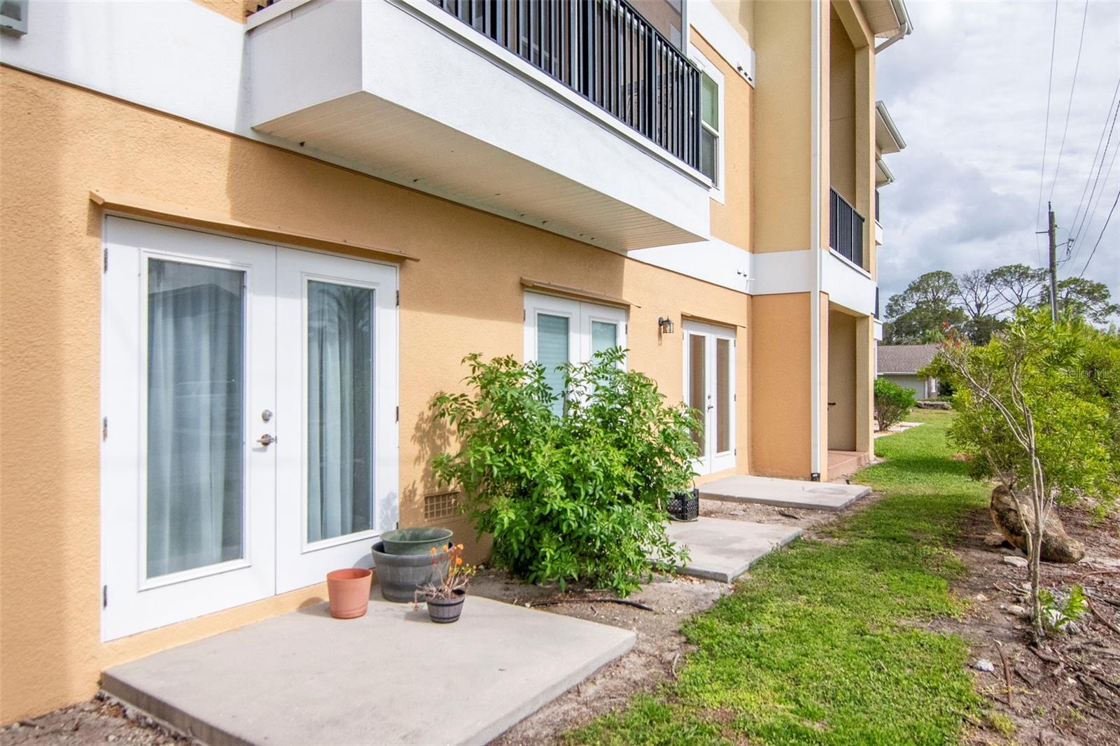 French doors off of the bonus room . Prefect for a BBQ space - 6395 BANYAN BLVD #303, NEW PORT RICHEY