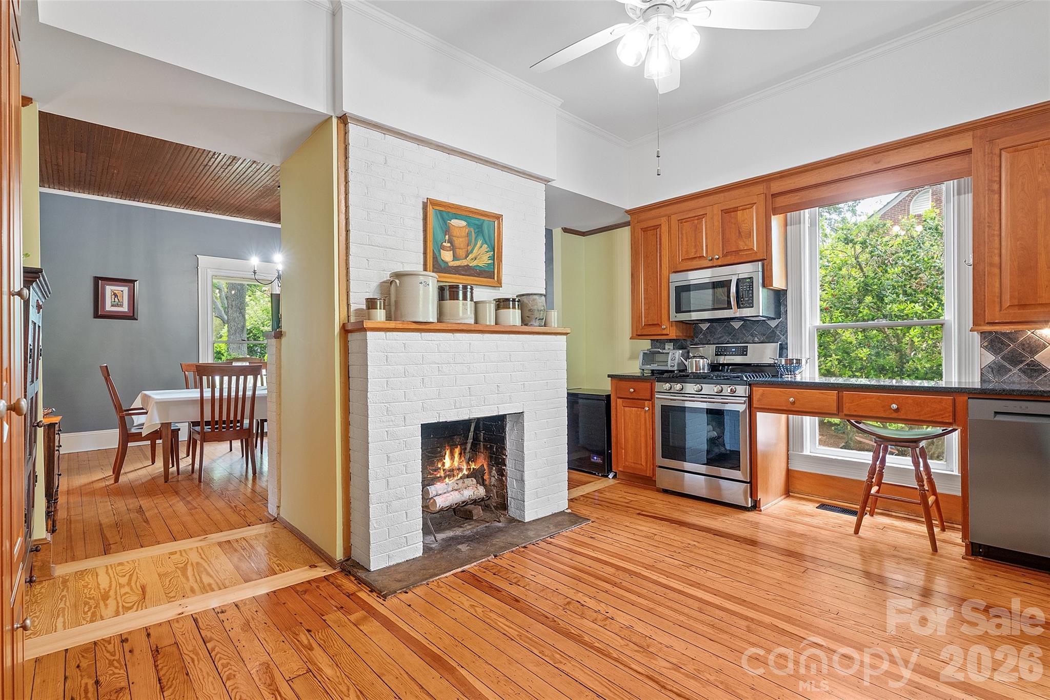 Charming fireplace in kitchen - 602 N Main Street, Davidson