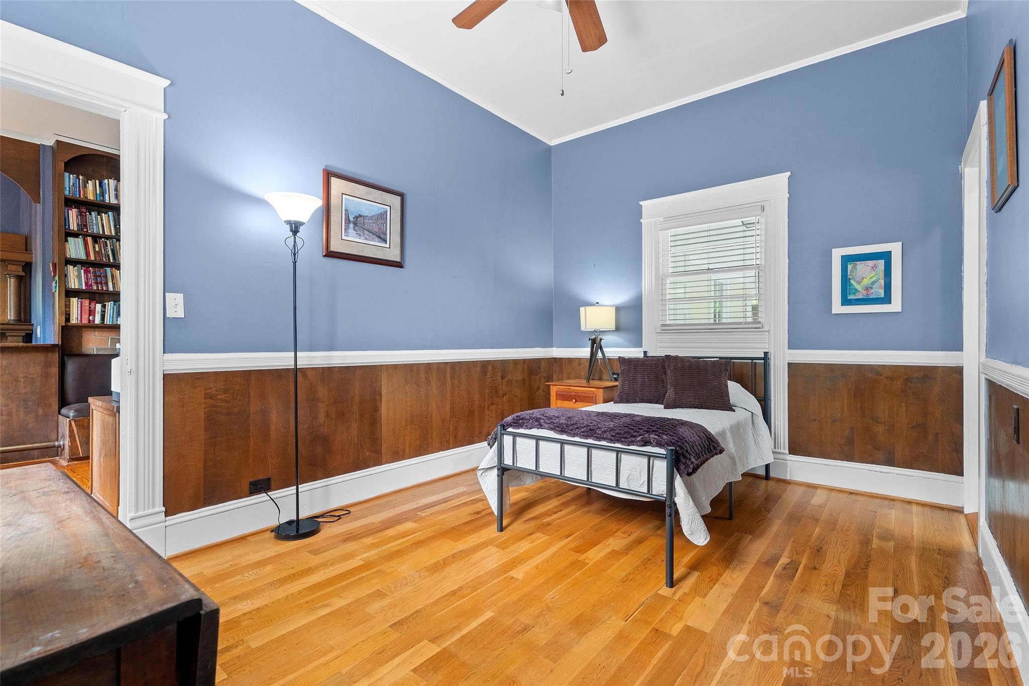 The main-level primary suite includes an ensuite bath and an attached true study. An expansion of the primary bedroom into the adjoining study is well within the realm of possibility. Bedroom 1 of 5 - 602 N Main Street, Davidson