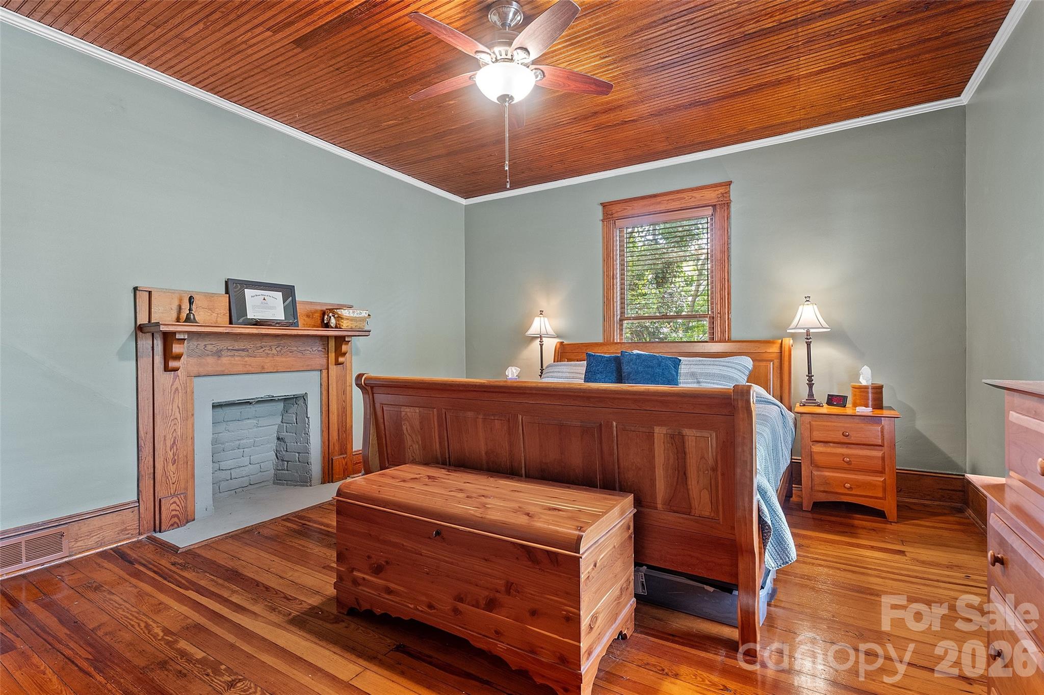 Second floor bedrooms are spacious with hardwood floors, wood bead board ceilings, fireplaces and closets. Bedroom 5 of 5 - 602 N Main Street, Davidson