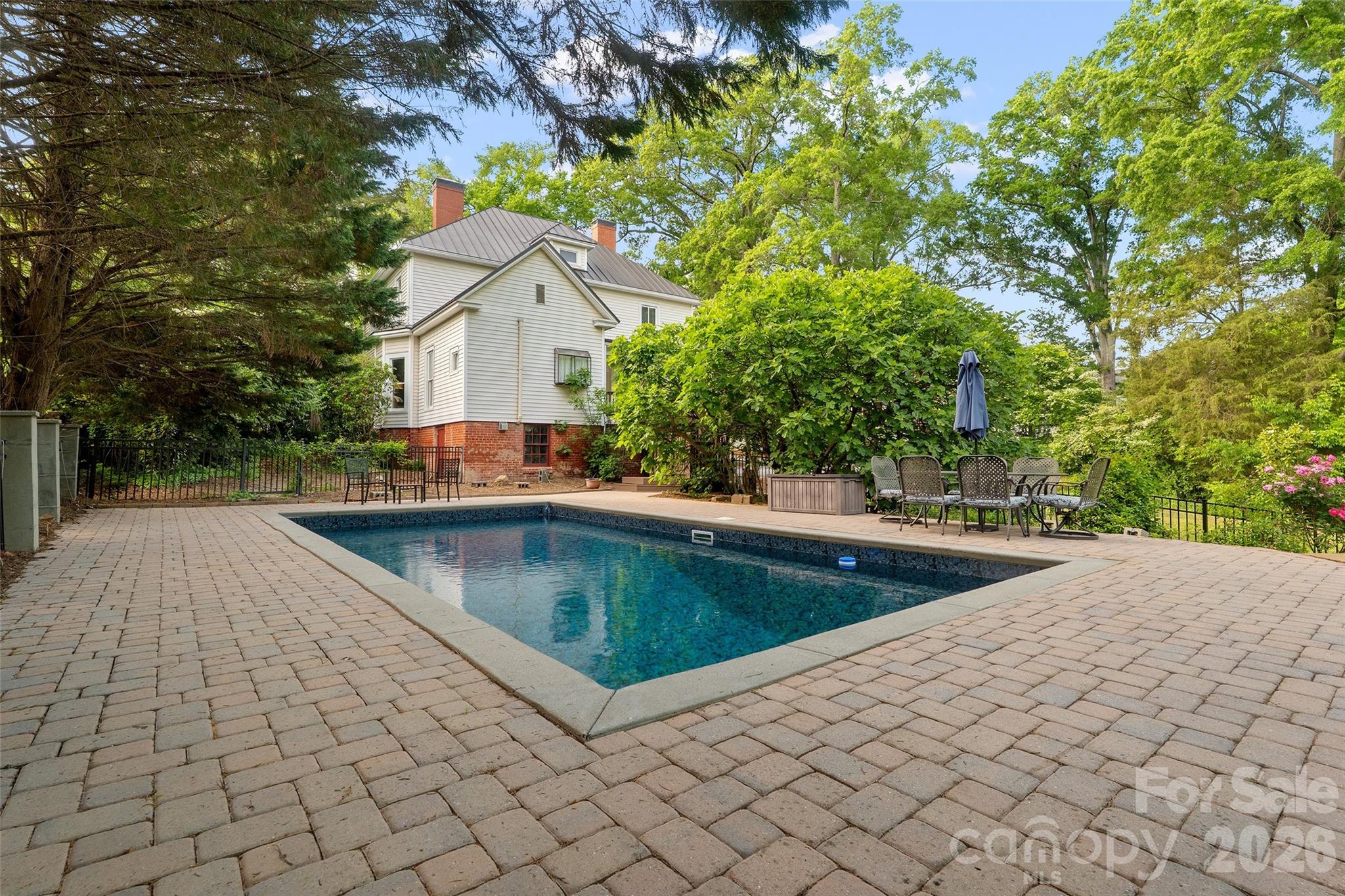 As an added bonus, this historic home has a modern amenity- in ground pool, fenced with paver surround; brand new liner installed this Spring. - 602 N Main Street, Davidson