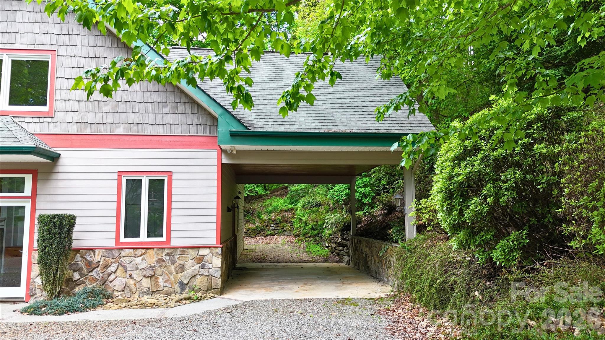 Covered parking at the entrance to your home. - 905 Old Fiddle Road, Waynesville