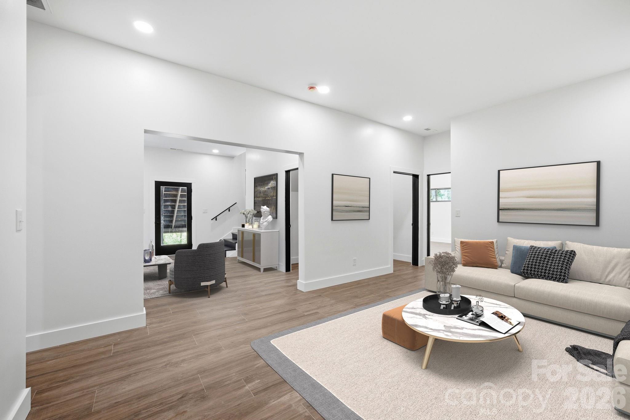 Lower Level Living Area - Virtually Staged - 102 Sandpiper Palisades Street, Hendersonville