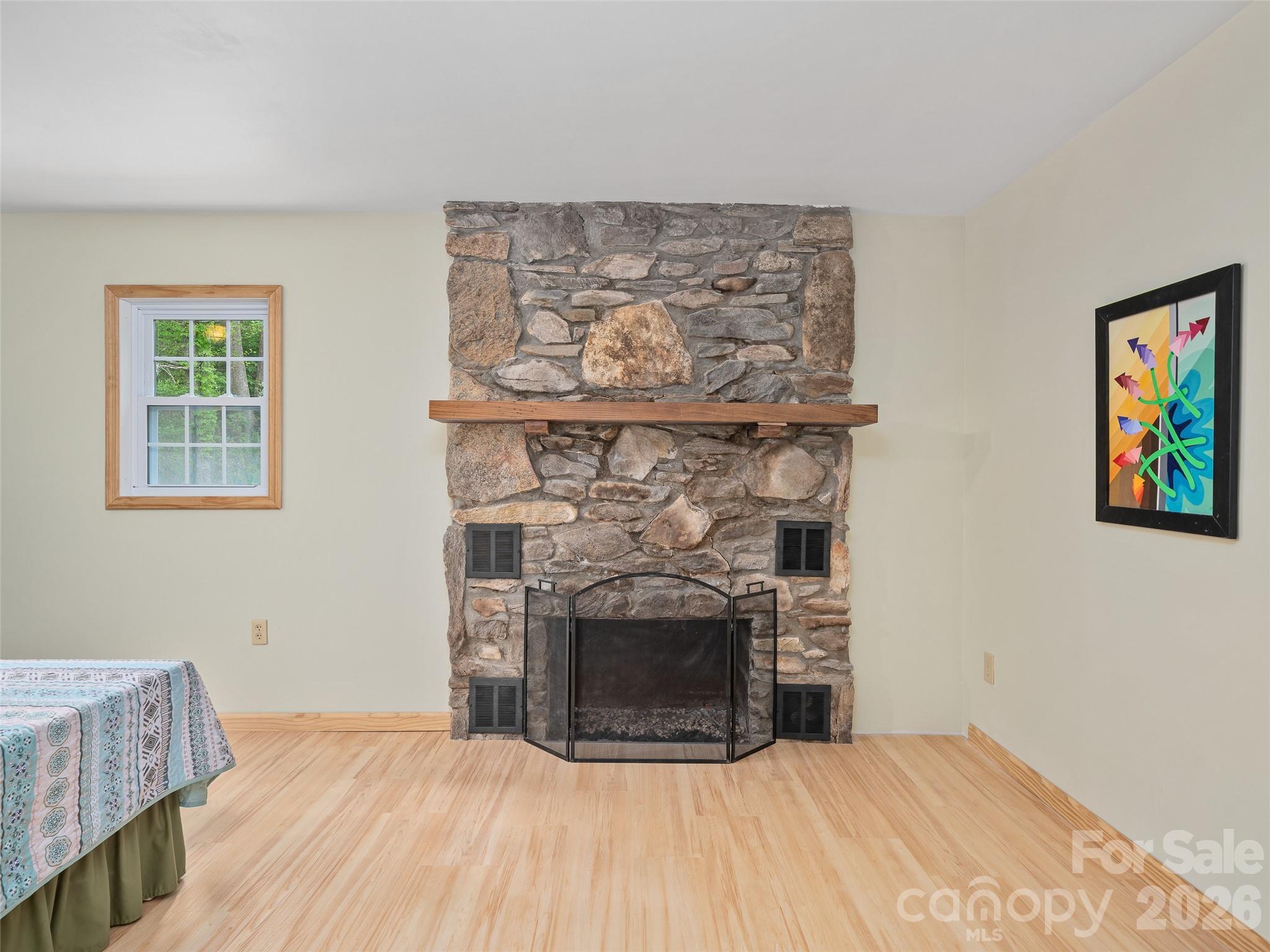 Gas Log Fireplace in Primary Bedroom - 3829 Coxes Creek Road, Burnsville