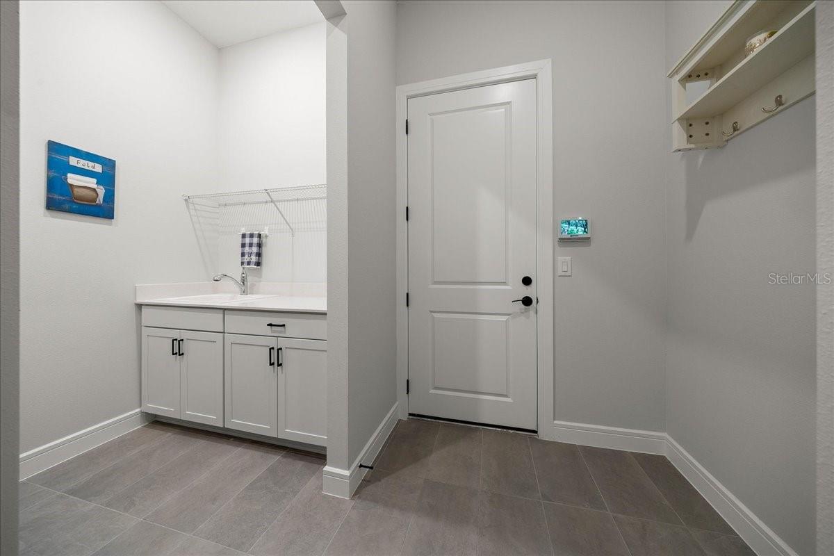 Laundry Room with Cabinets and Sink - 6015 SW 86TH CIR, OCALA