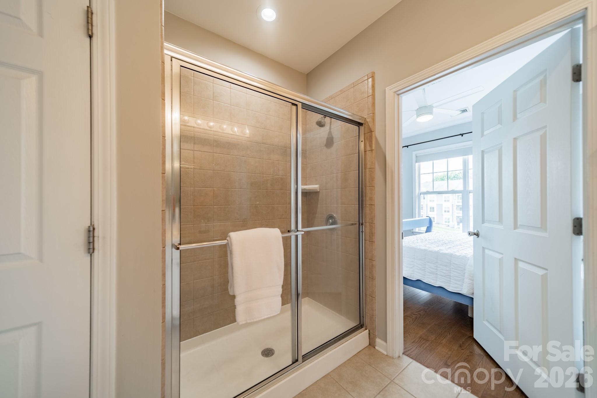 Primary bath has been updated with this attractive, spacious walk-in shower. - 18736 Nautical Drive, Cornelius