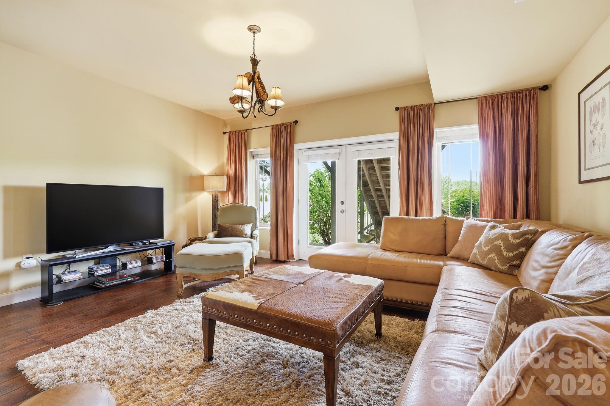 Large Ground Level Family Room with French Door Leading to Expansive Patio - 112 Sunny Morning Court, Hendersonville