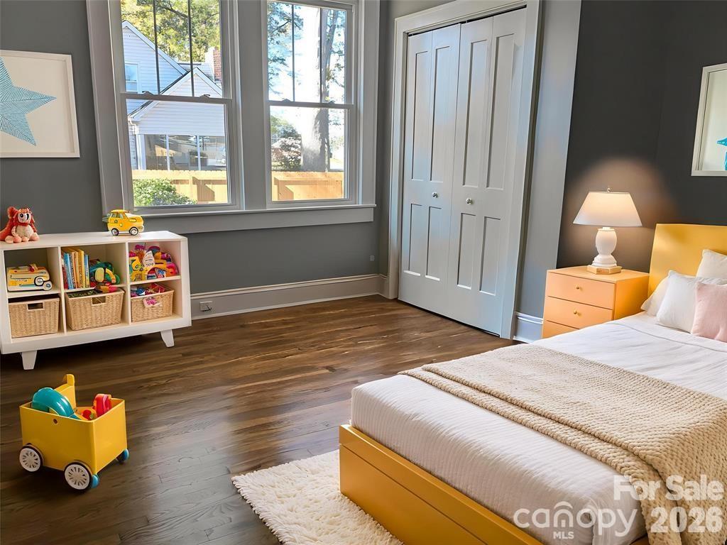 Virtually Staged Bedroom 2 w/ roomy play space & lots of sunshine. - 933 W Warren Street, Shelby