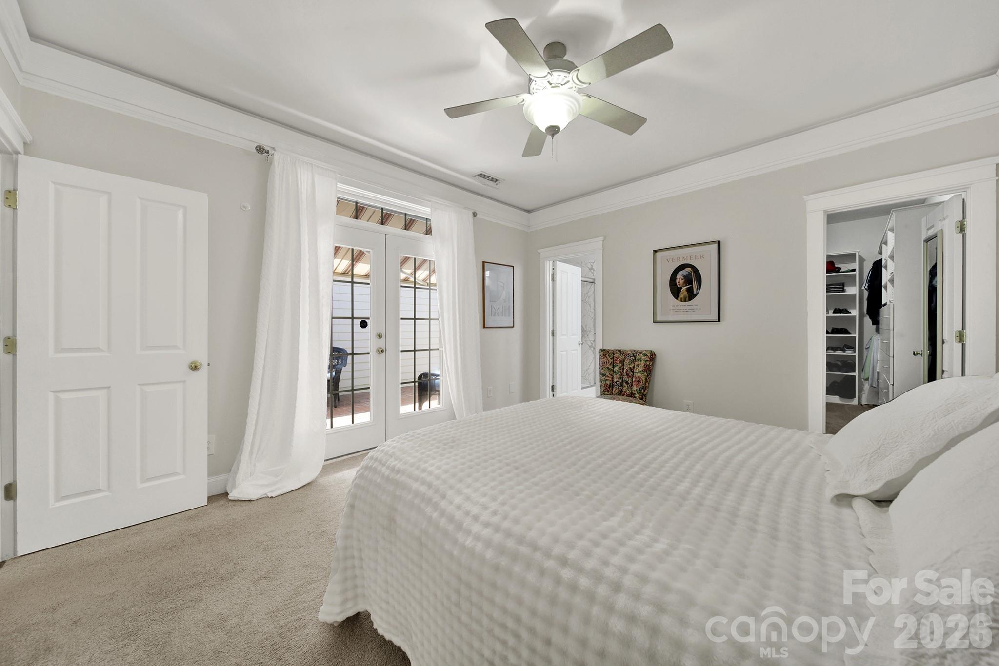 Primary Bedroom with French Doors Leading to Private Patio - 4214 Settler Heights Drive, Fort Mill