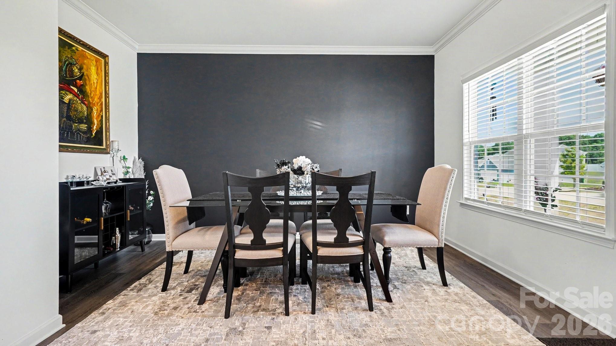 Den being used as dining room - 178 Wickham Court, Clemmons