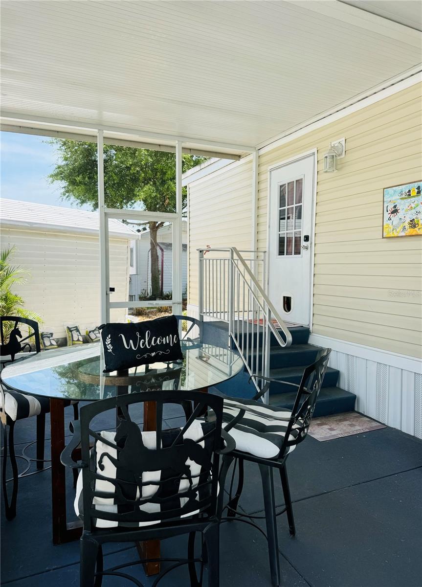 Enjoy your morning coffee in the screened in patio - 300 ROYAL TROON LOOP, DAVENPORT