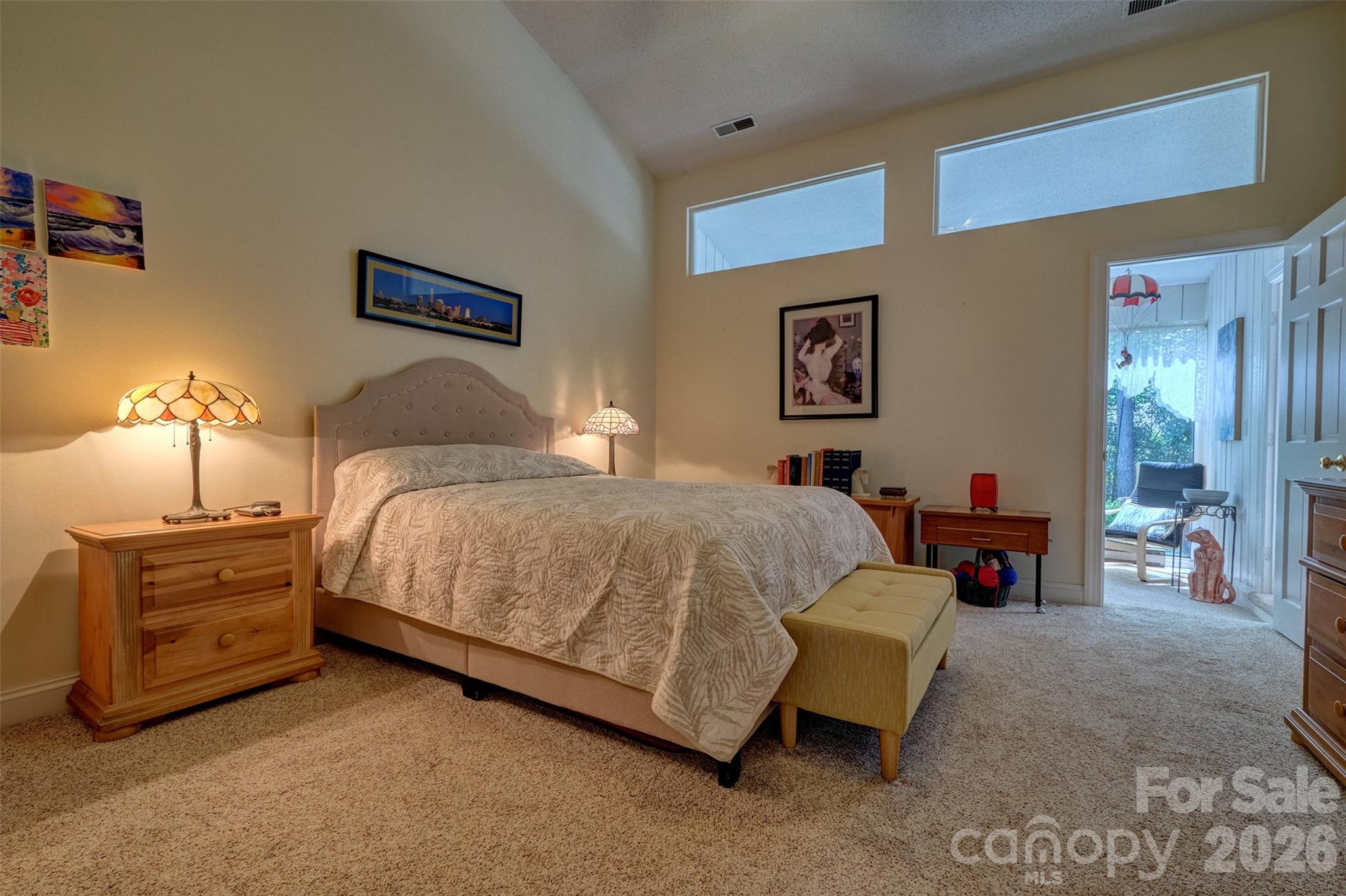 Master bedroom opens to sunroom - 114 Pine Grove Circle, Lake Wylie