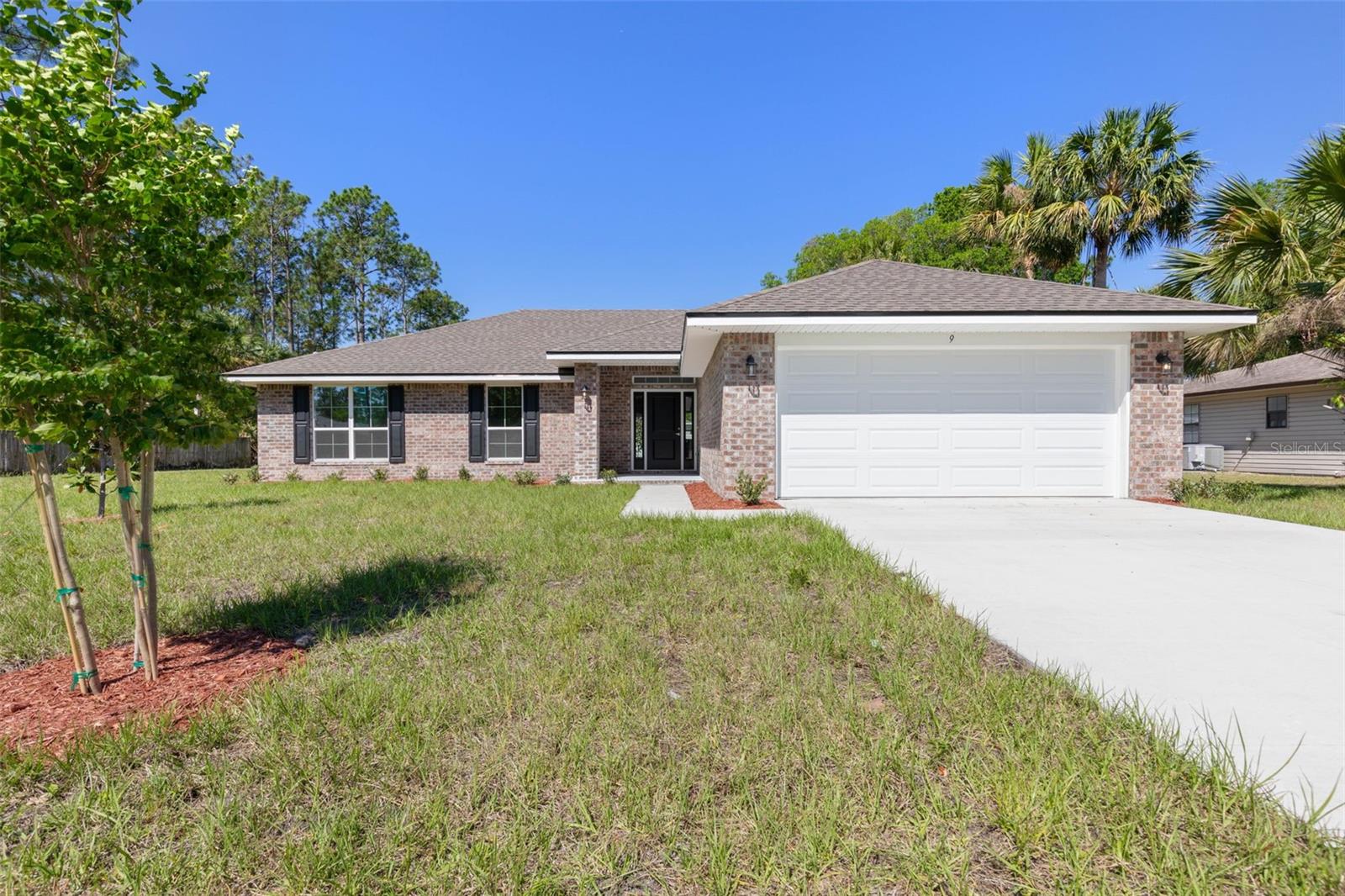 Single Family Residence at 105 PALMWOOD DR, PALM COAST