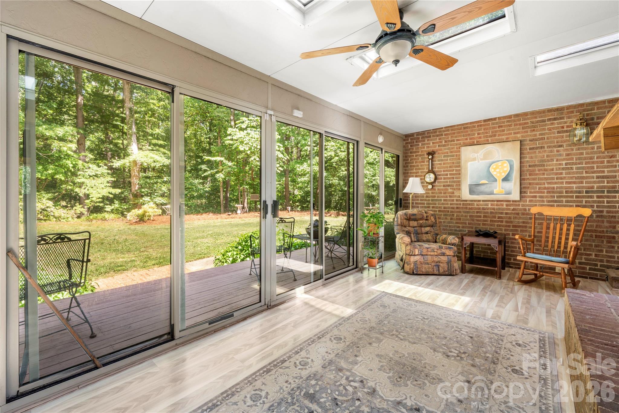 Sunroom looking out to backyard and deck - 3426 Driftwood Drive, Gastonia