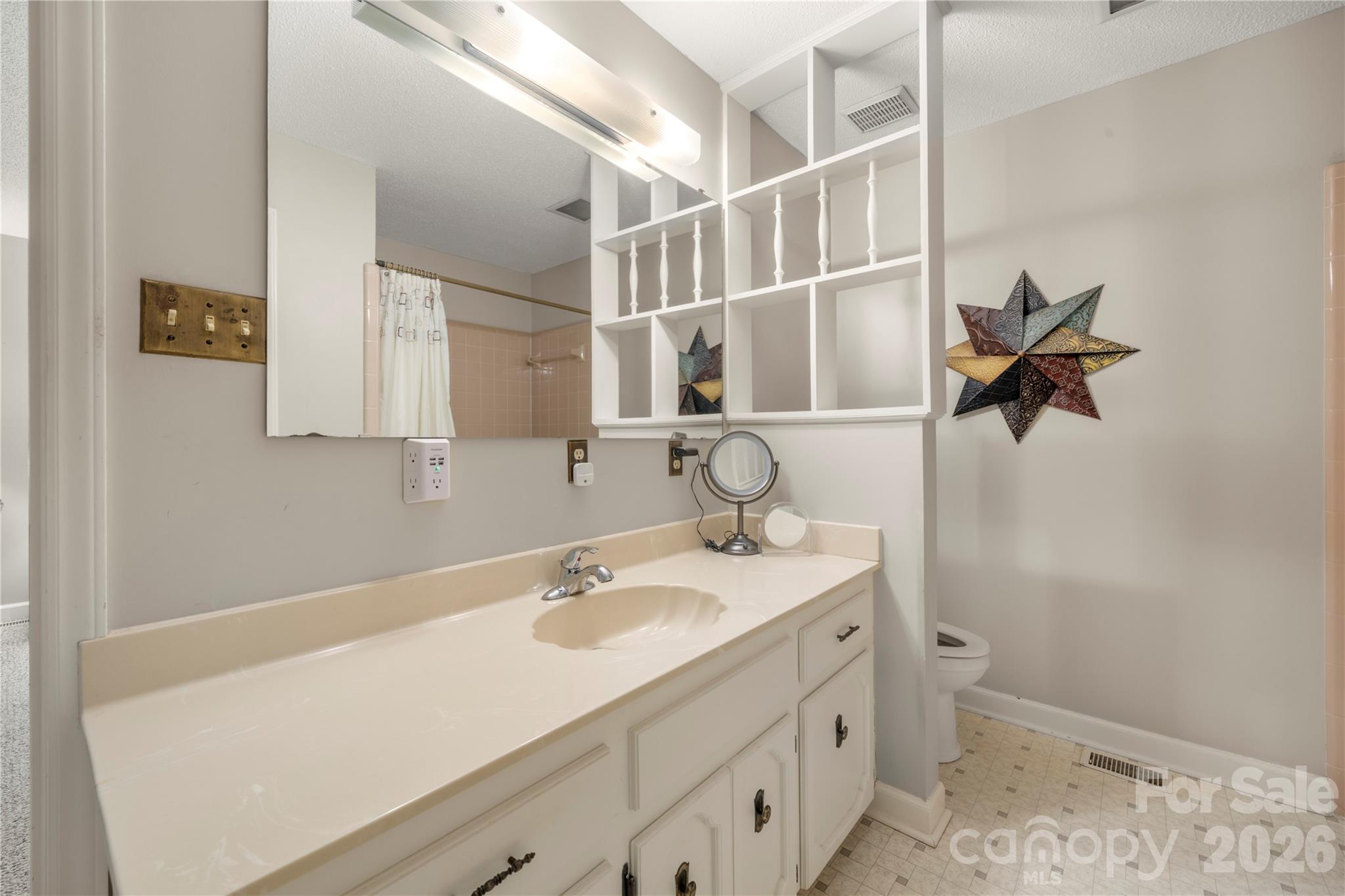 Primary bathroom with added storage - 3426 Driftwood Drive, Gastonia