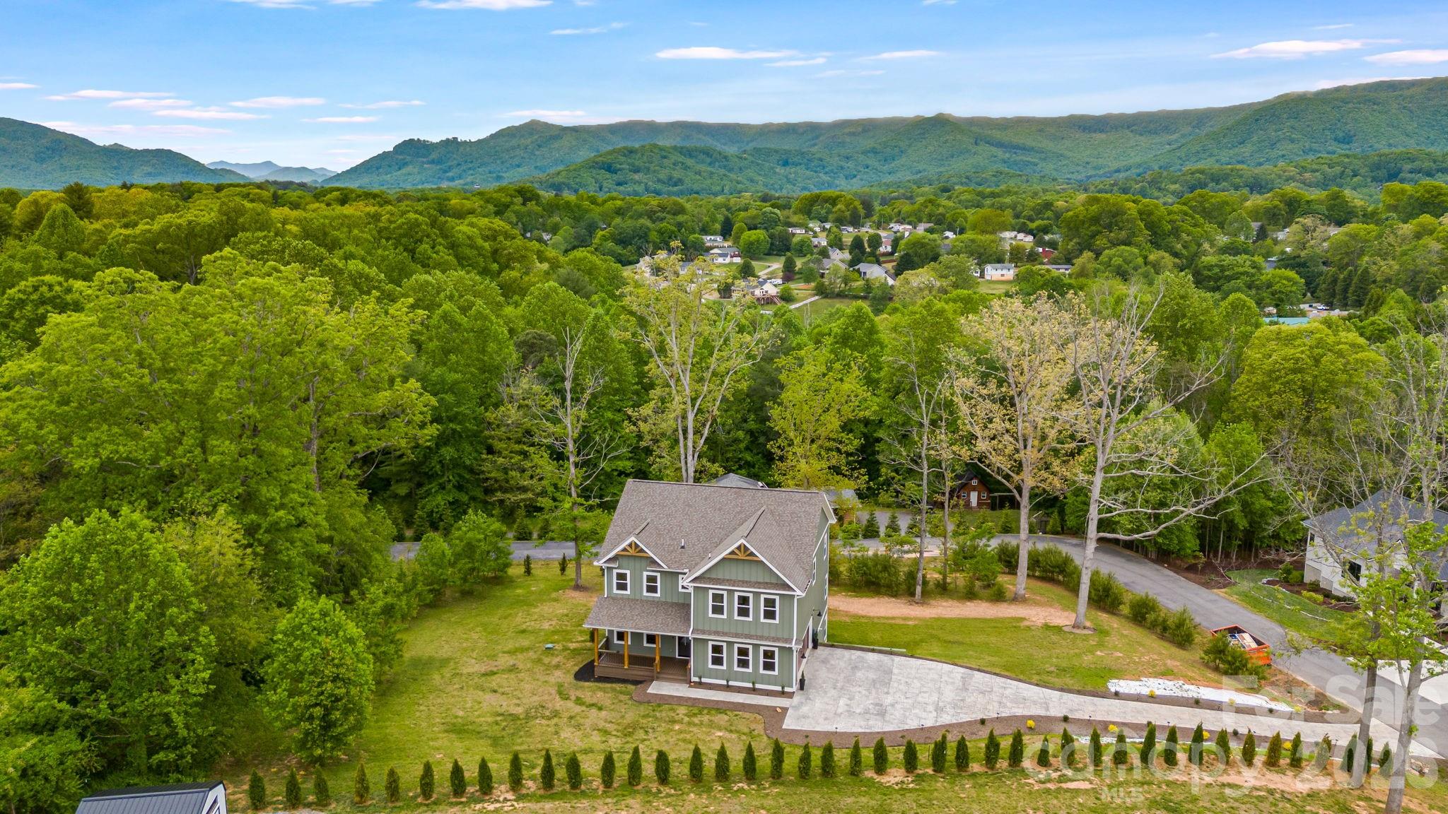Single Family Residence at 17 Baxter Woods Lane, Candler, photo 2 of 41