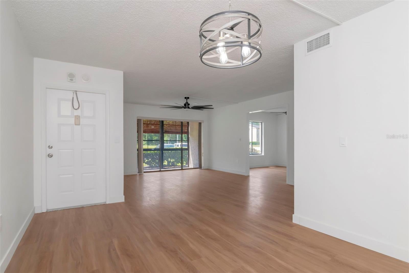 Spacious Living & Dining Area - 3211 LAKE PINE WAY E #A1, TARPON SPRINGS