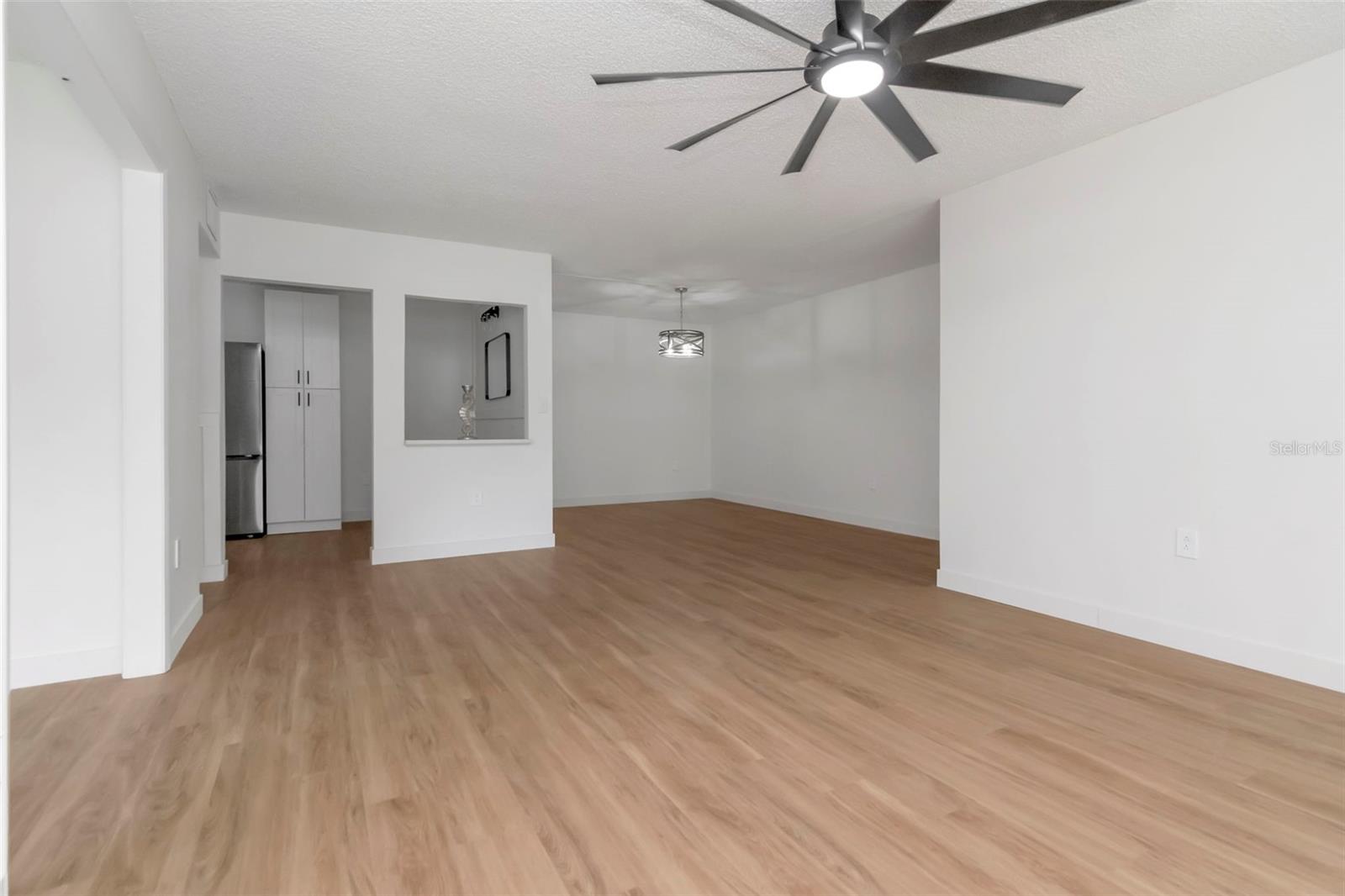 Seamless Living, Dining & Kitchen Layout - 3211 LAKE PINE WAY E #A1, TARPON SPRINGS