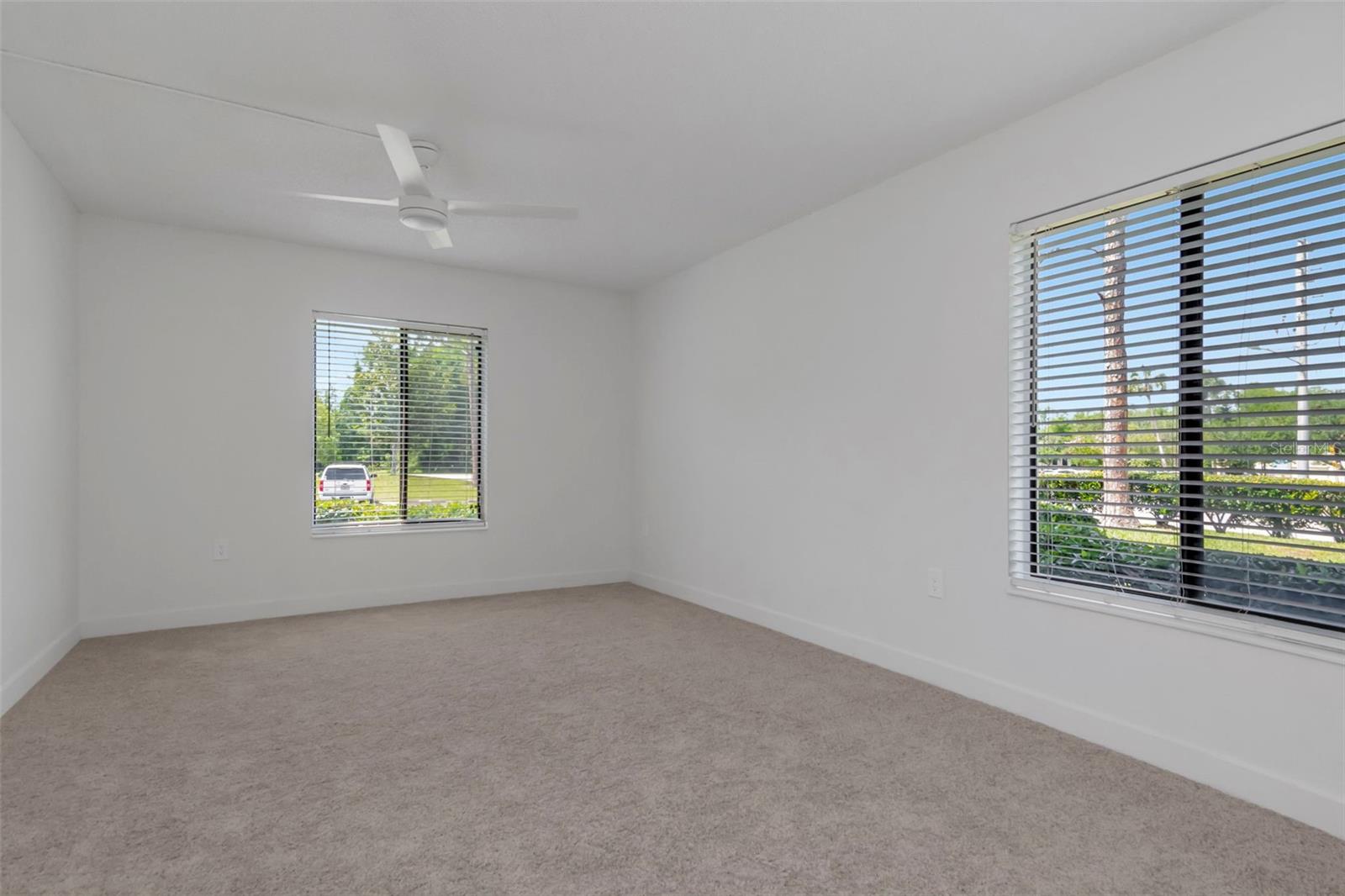 Bright Primary Bedroom with Private Bath - 3211 LAKE PINE WAY E #A1, TARPON SPRINGS