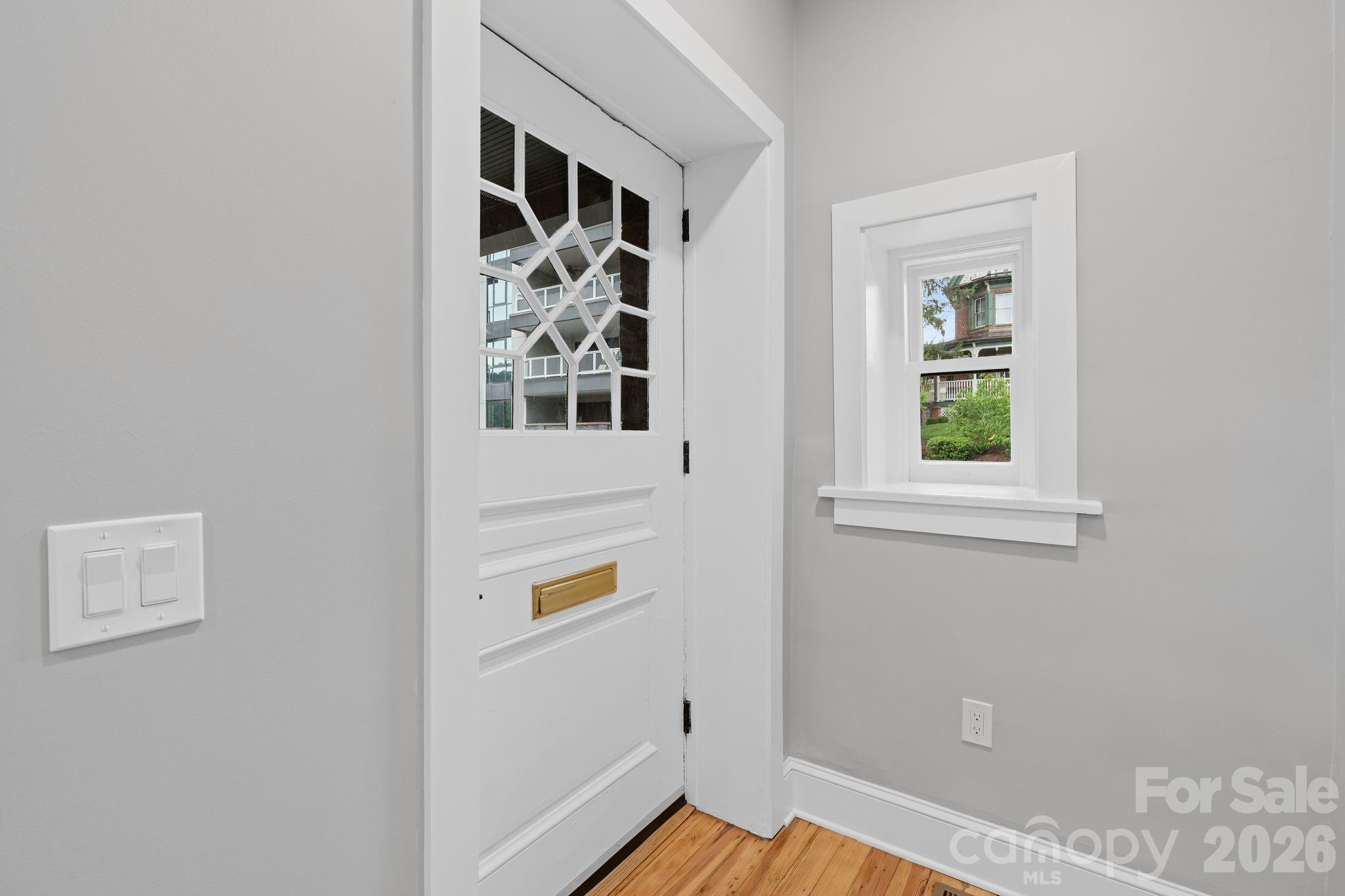 Front door with historic glass detailing - 134 Biltmore Avenue, Asheville