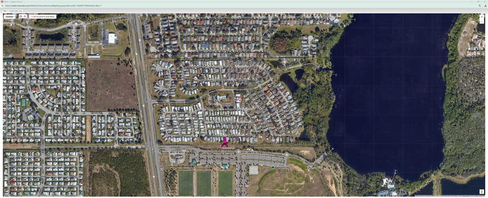 Aerial view of subdivision and lake - 50989 HIGHWAY 27 #87, DAVENPORT