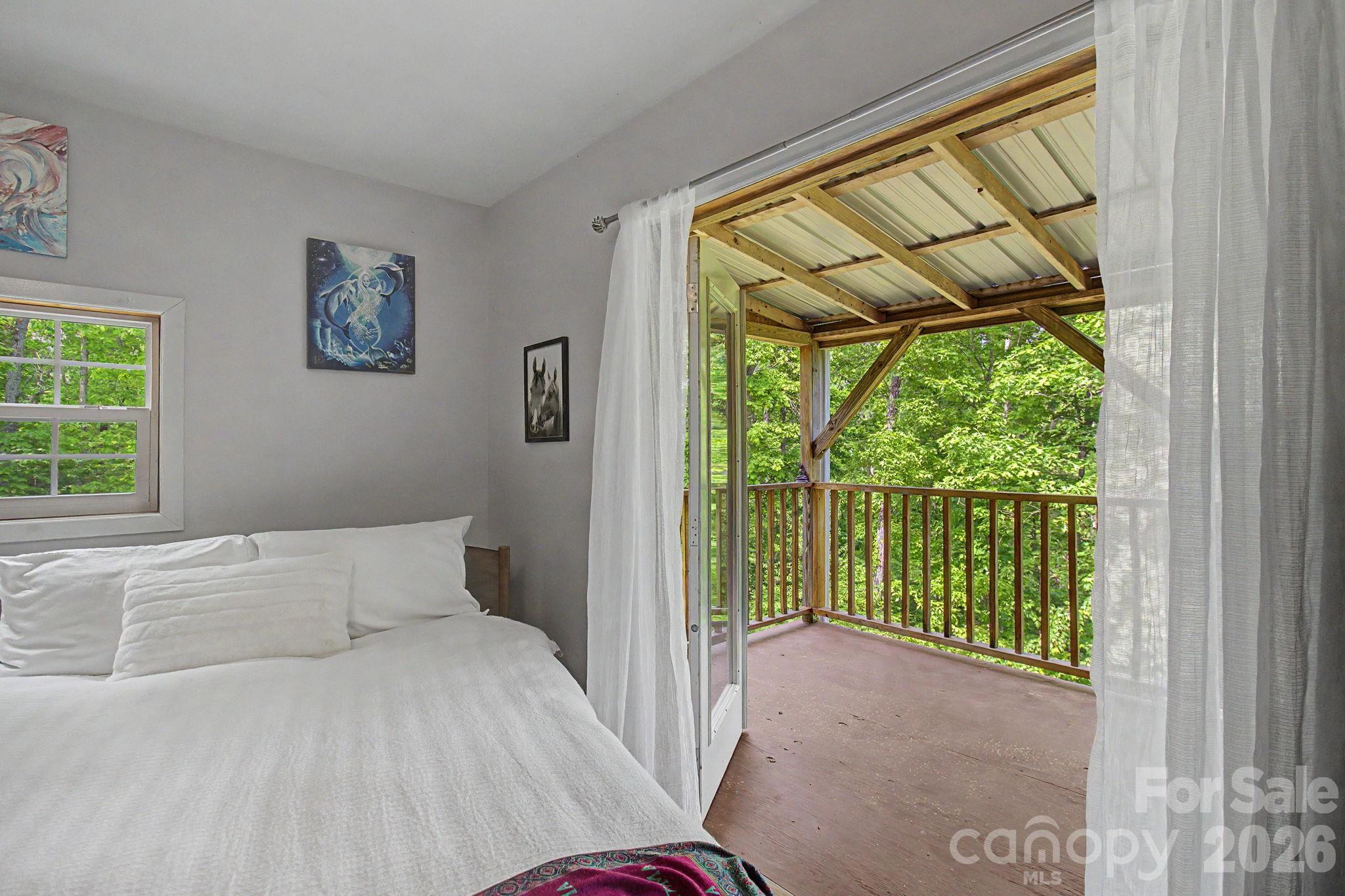 Enjoy Fresh Mountain Air and Deck Access Once You Step Out of Bed - 288 Rebel Drive, Hot Springs