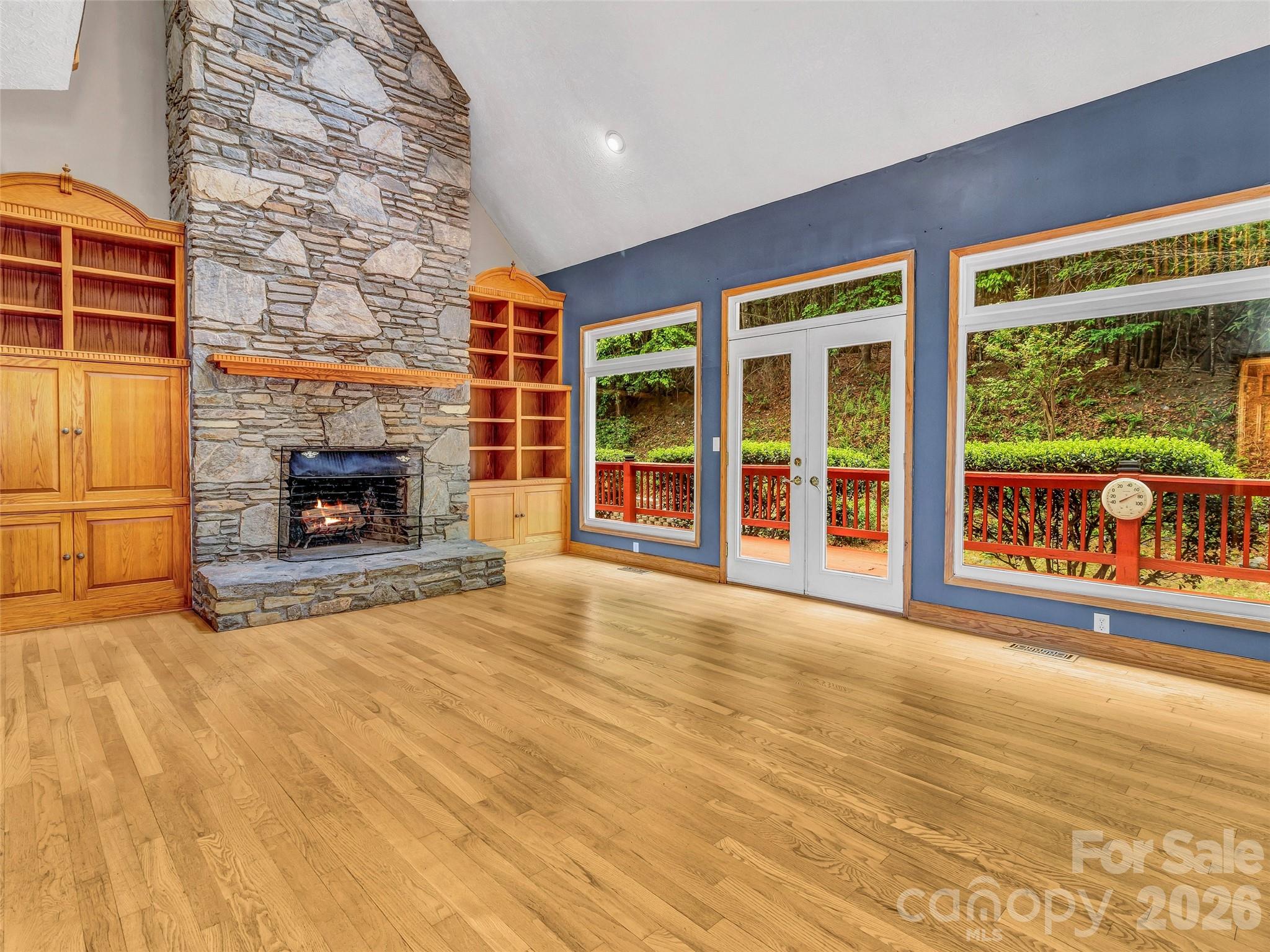 Great room with floor to ceiling stone fireplace. - 287 Shady Creek Lane, Hendersonville