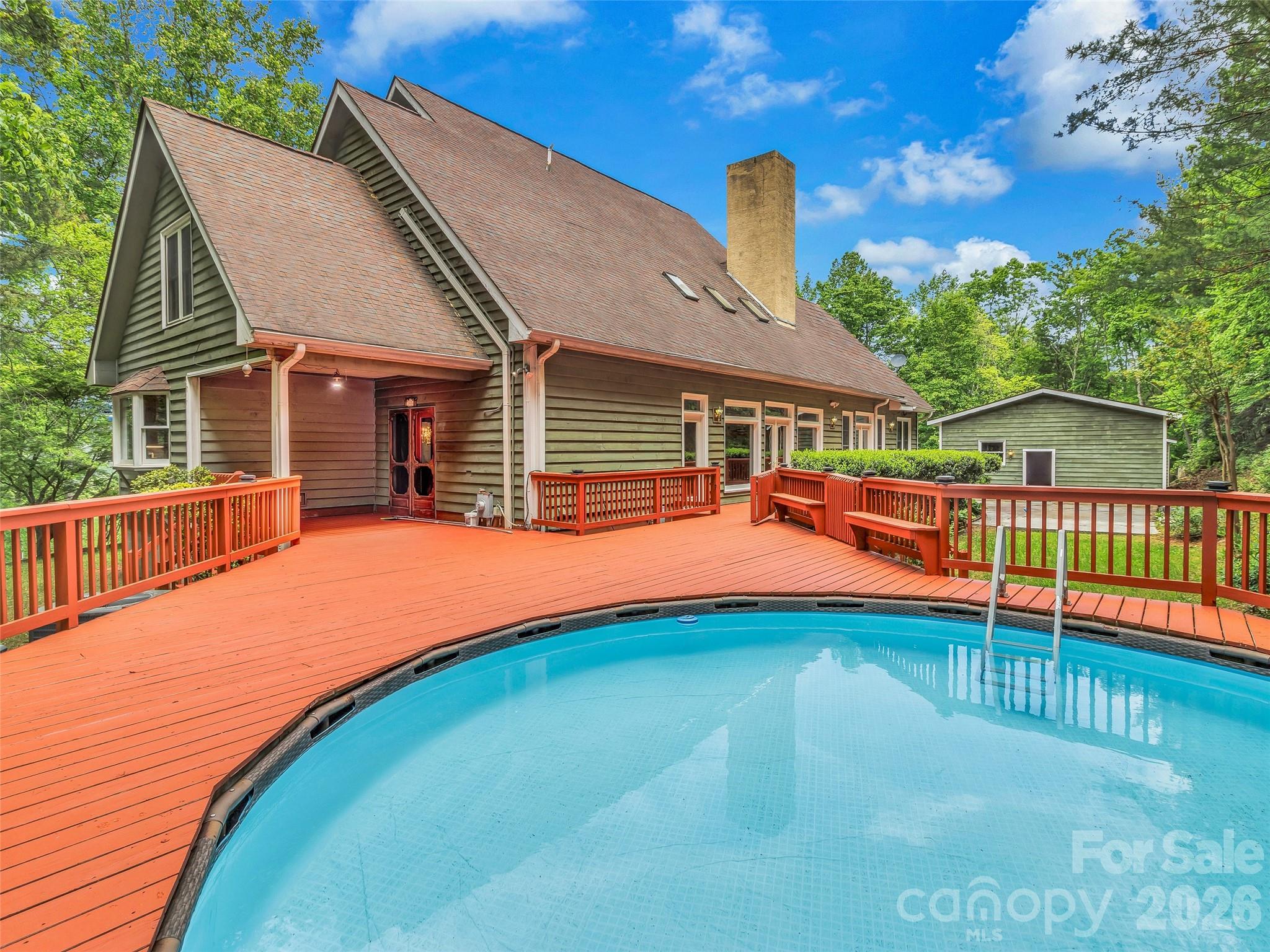 Large deck with new deck boards last year and pool. - 287 Shady Creek Lane, Hendersonville