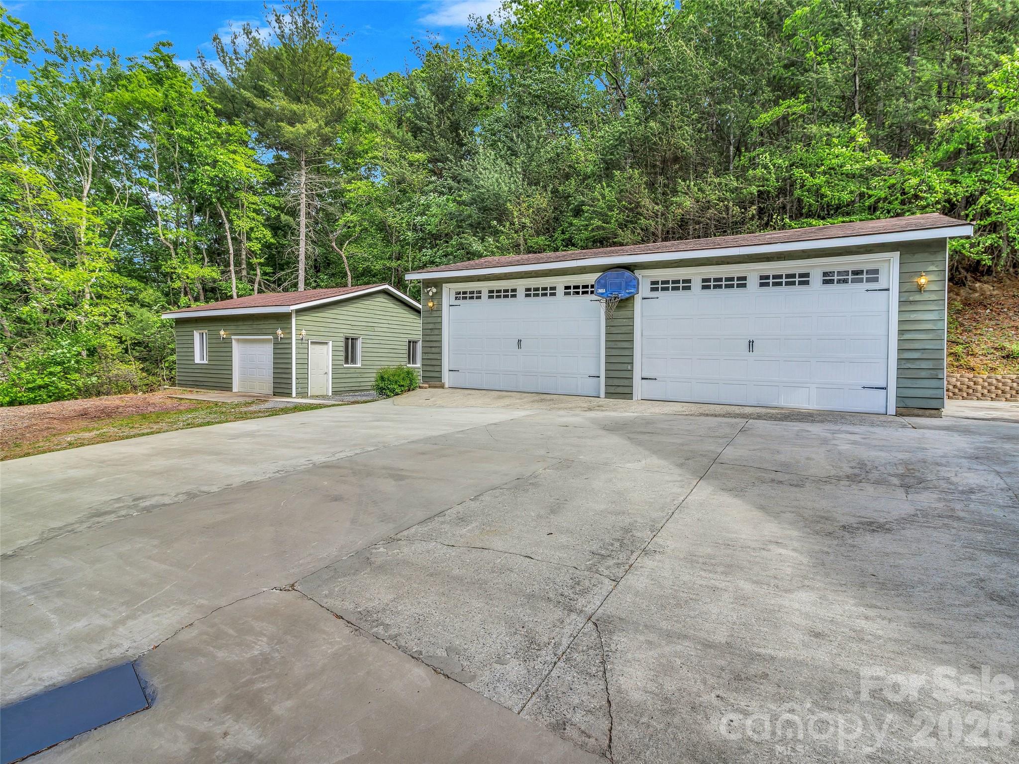 Oversized 4 car garage and separate large work shop with extra storage loft and GYM. - 287 Shady Creek Lane, Hendersonville