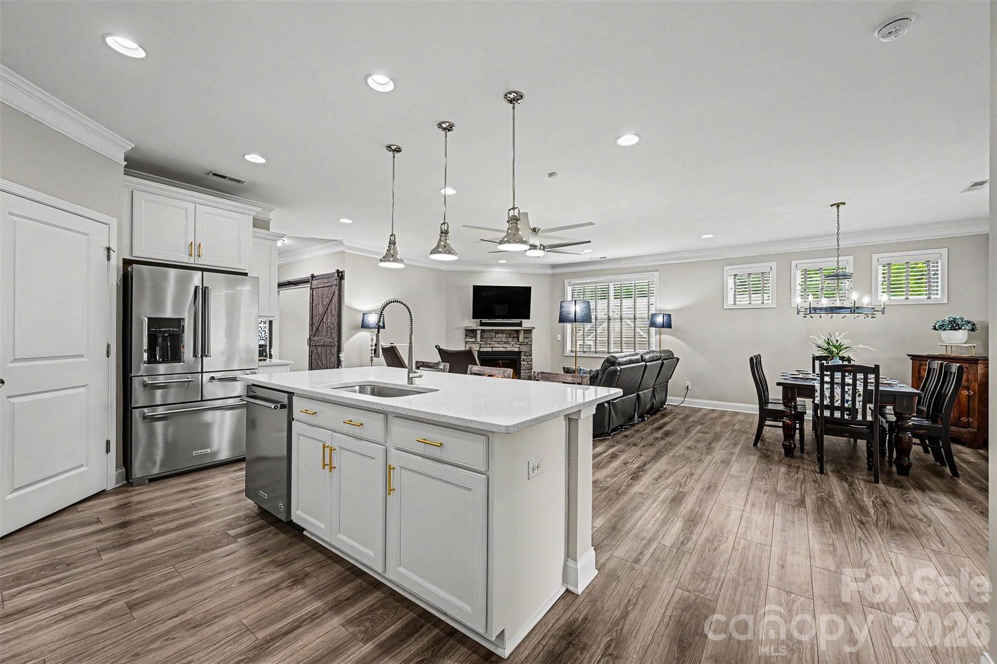 Eat-up bar kitchen open to great room and dining room - 122 Boatwright Lane, Mooresville