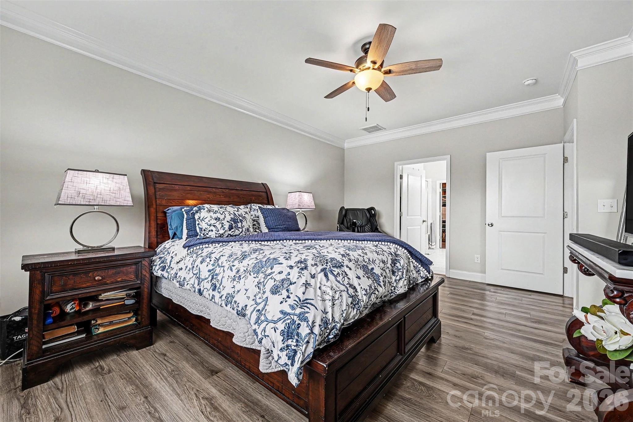 Elegant oversized primary bedroom tucked at the rear of the home - 122 Boatwright Lane, Mooresville