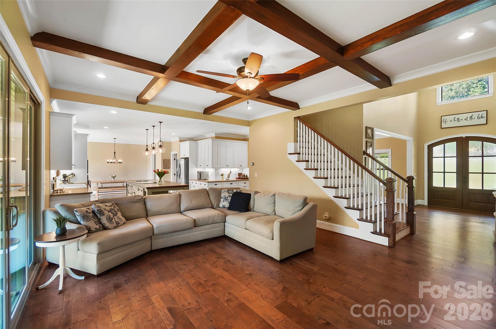 Living room with decorative ceiling beams - 3612 Lake Twitty Drive, Monroe